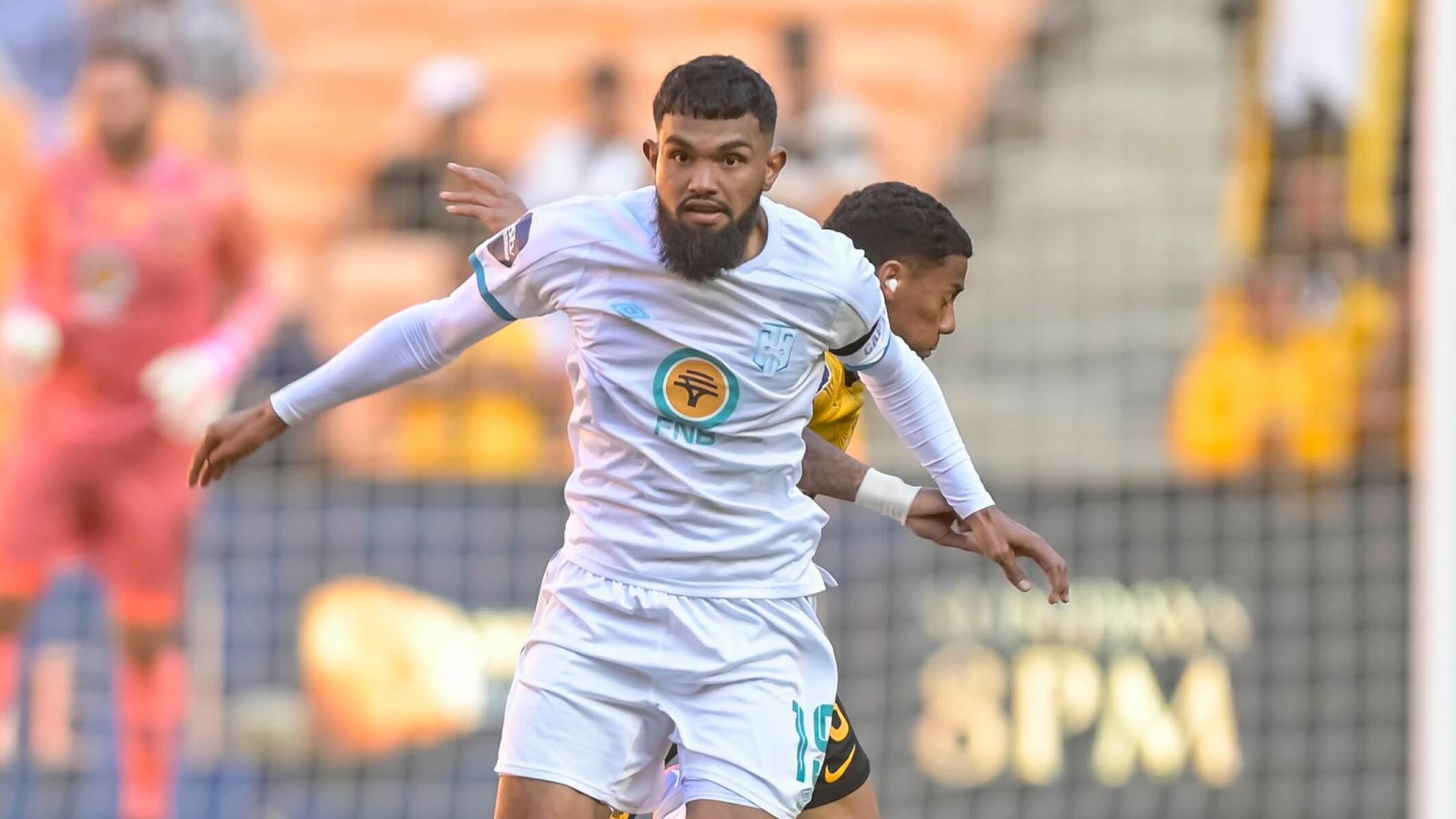 Keanu Cupido of Cape Town City and Dillan Solomons of Kaizer Chiefs fight for the ball during the DStv Premiership match at the FNB Stadium in Johannesburg