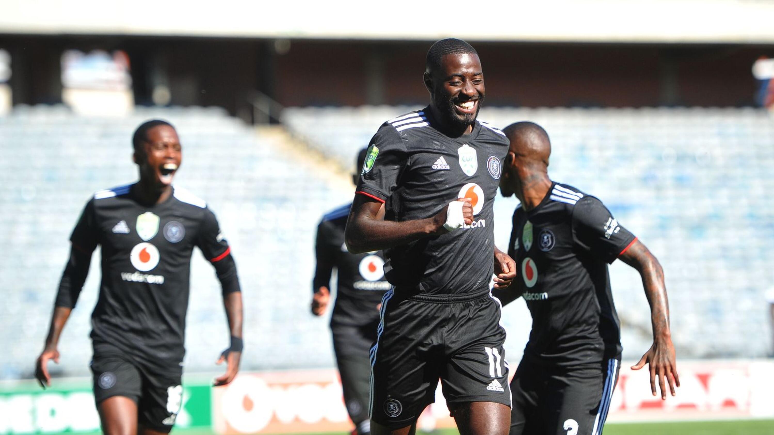 Deon Hotto of Orlando Pirates celebrates with teammates after scoring the winning goal during the Nedbank Cup Last 32 match against AmaZulu at Orlando Stadium in Soweto, Johannesburg on Sunday