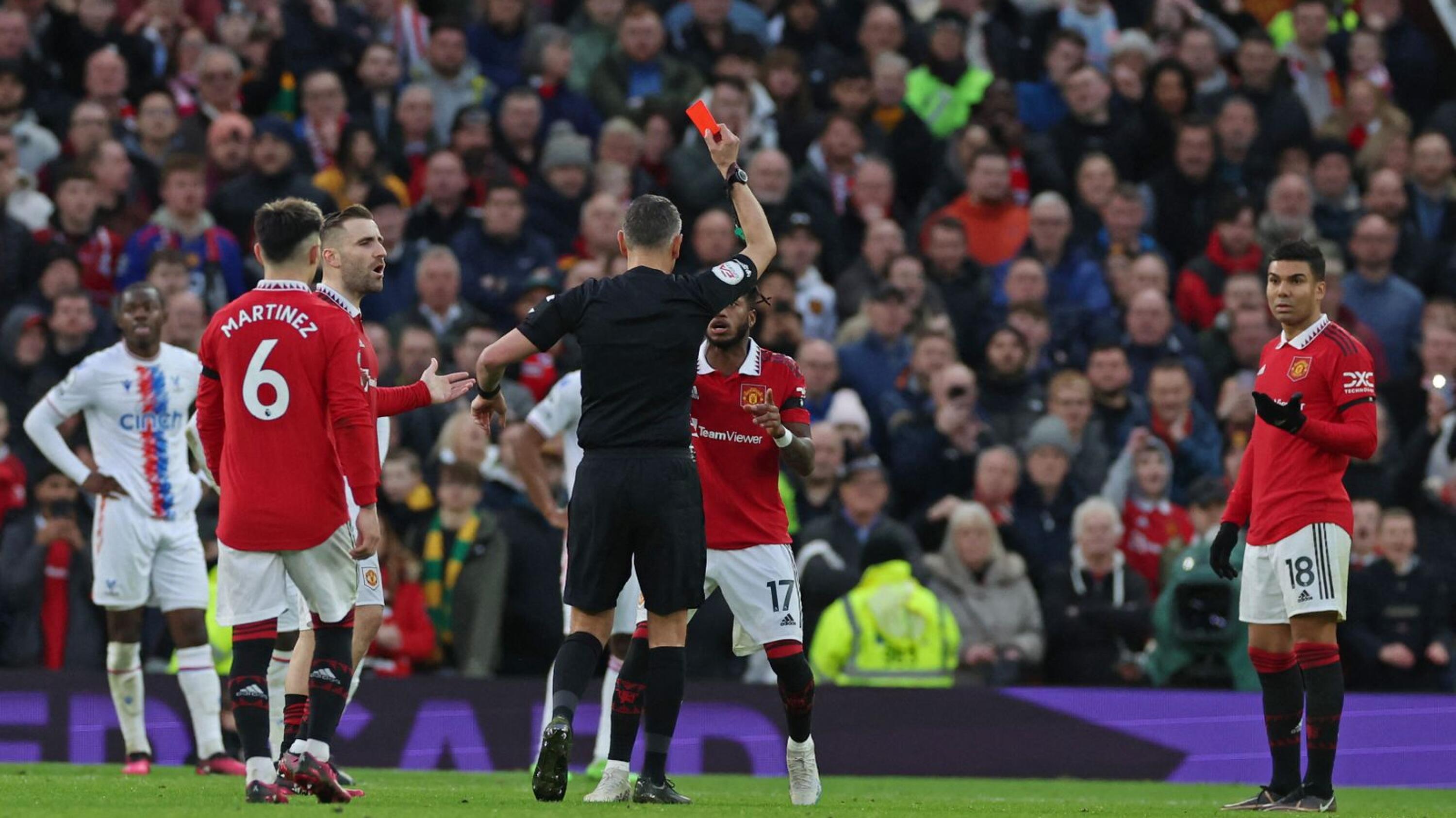 Manchester United's Casemiro is shown a red card by referee Andre Marriner during their Premier League game against Crystal Palace at Old Trafford in Manchester on Saturday