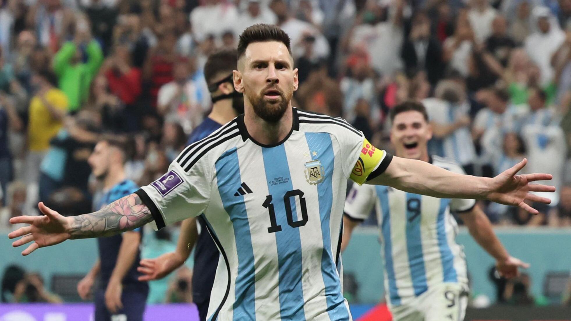 Argentina's Lionel Messi celebrates after scoring his team's first goal from the penalty spot during their World Cup semi-final against Croatia at Lusail Stadium in Lusail on Tuesday