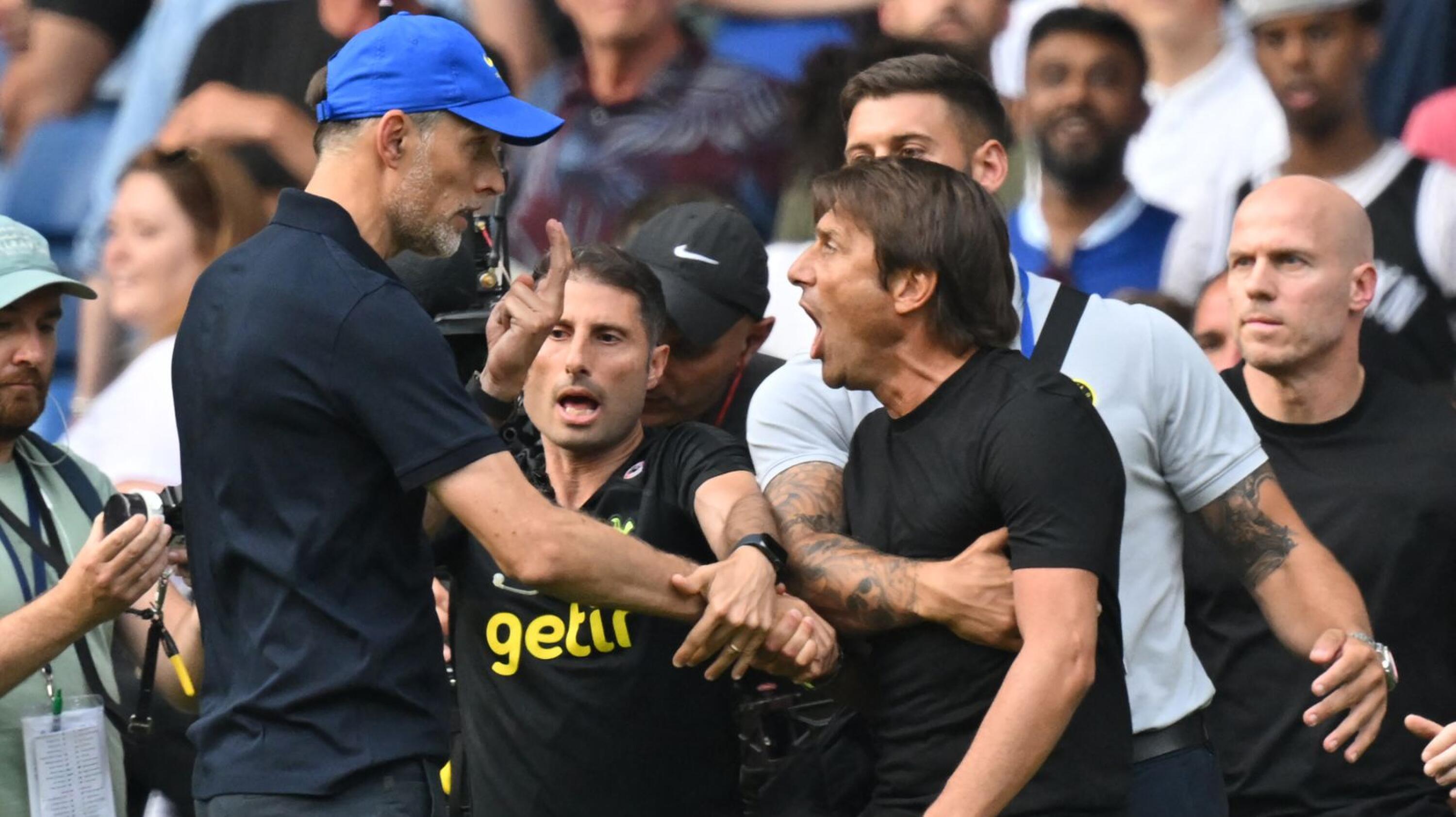 Tottenham Hotspur manager Antonio Conte (right) and Chelsea counterpart Thomas Tuchel square off during their Premier League clash at Stamford Bridge in London on Sunday