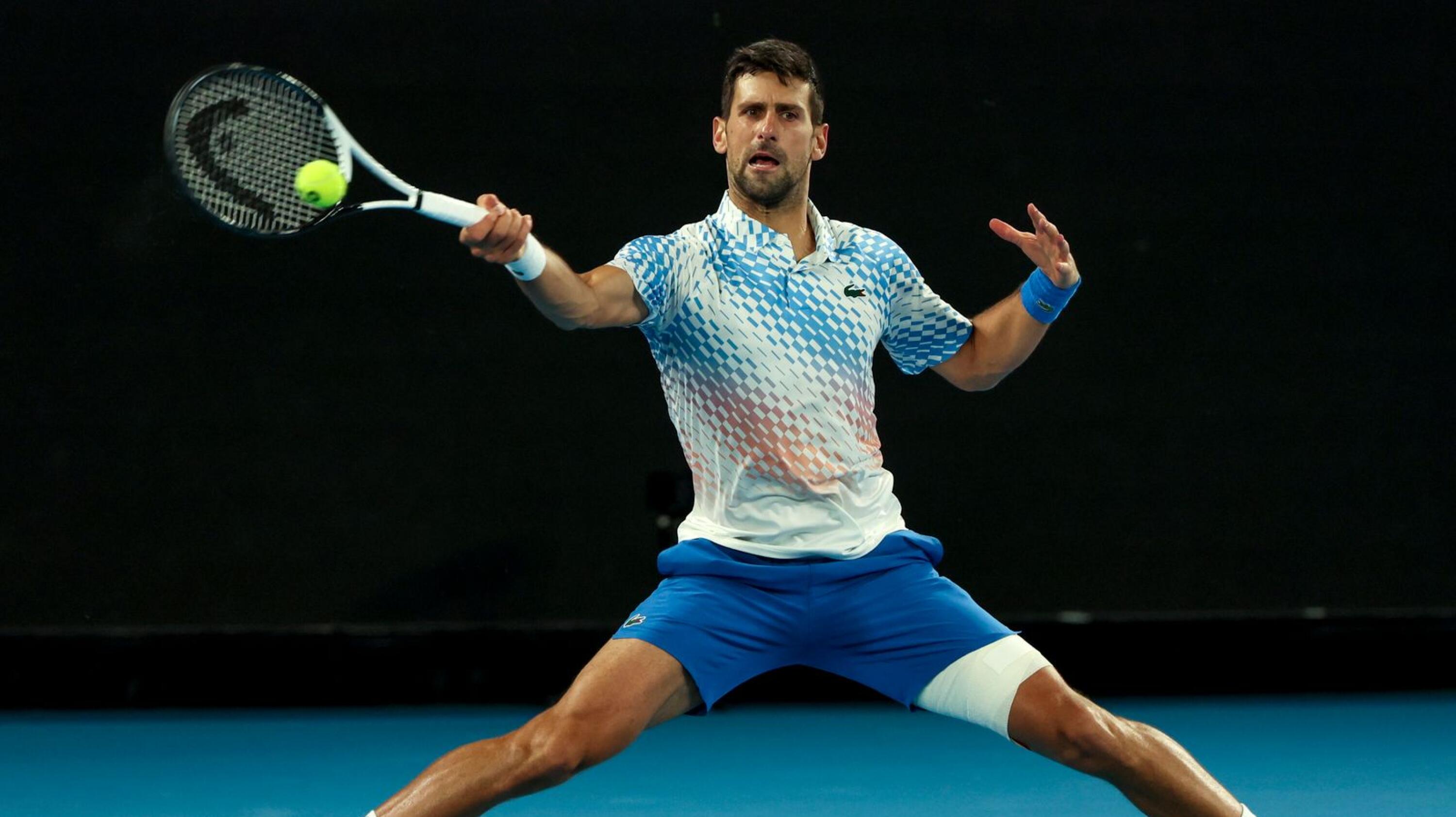 Novak Djokovic of Serbia in action during his quarter- final match against Andrey Rublev of Russia at the Australian Open tennis tournament in Melbourne
