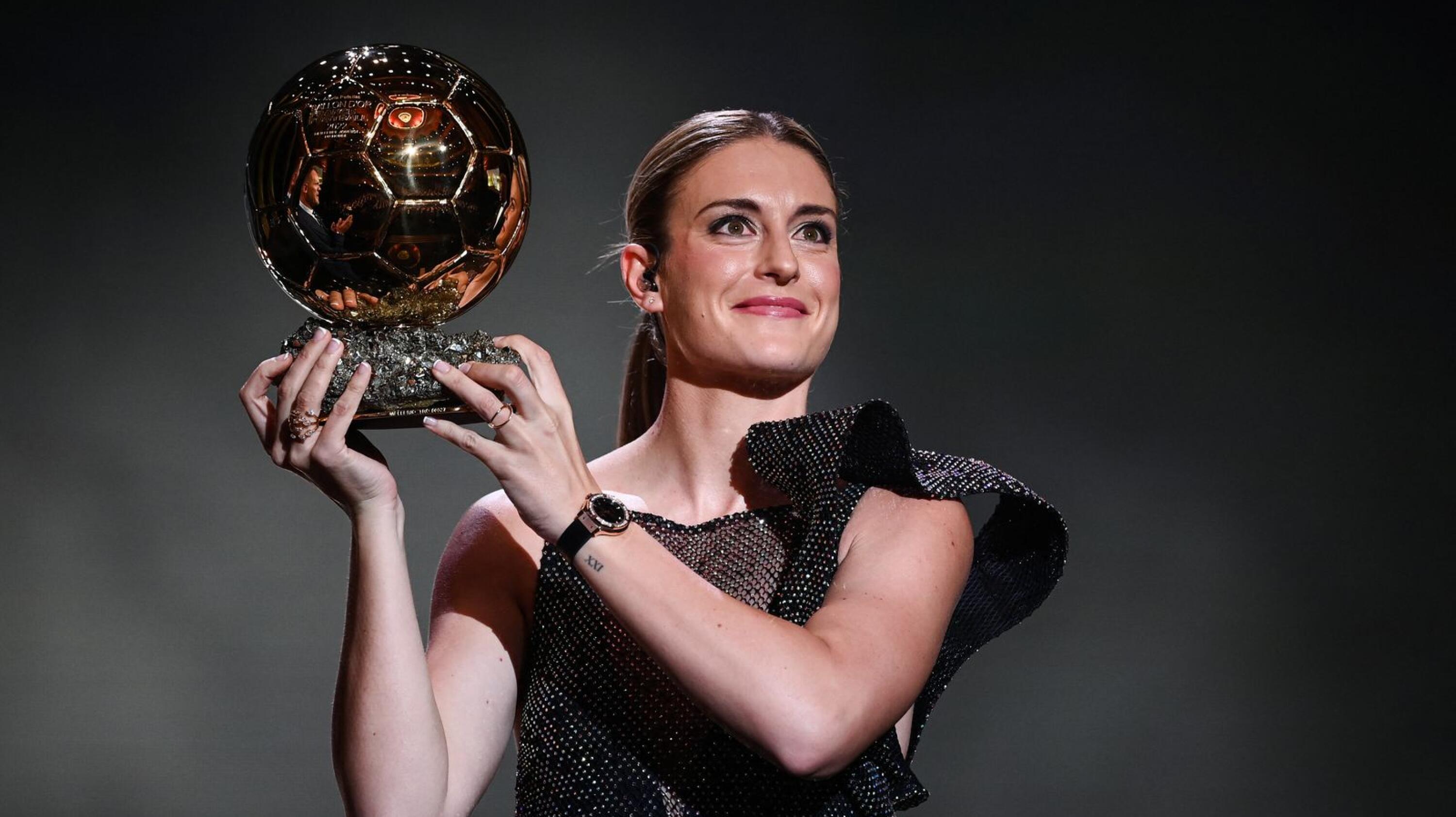 FC Barcelona's Spanish midfielder Alexia Putellas receives her second Woman Ballon d'Or award during the 2022 Ballon d'Or France Football award ceremony at the Theatre du Chatelet in Paris on Monday
