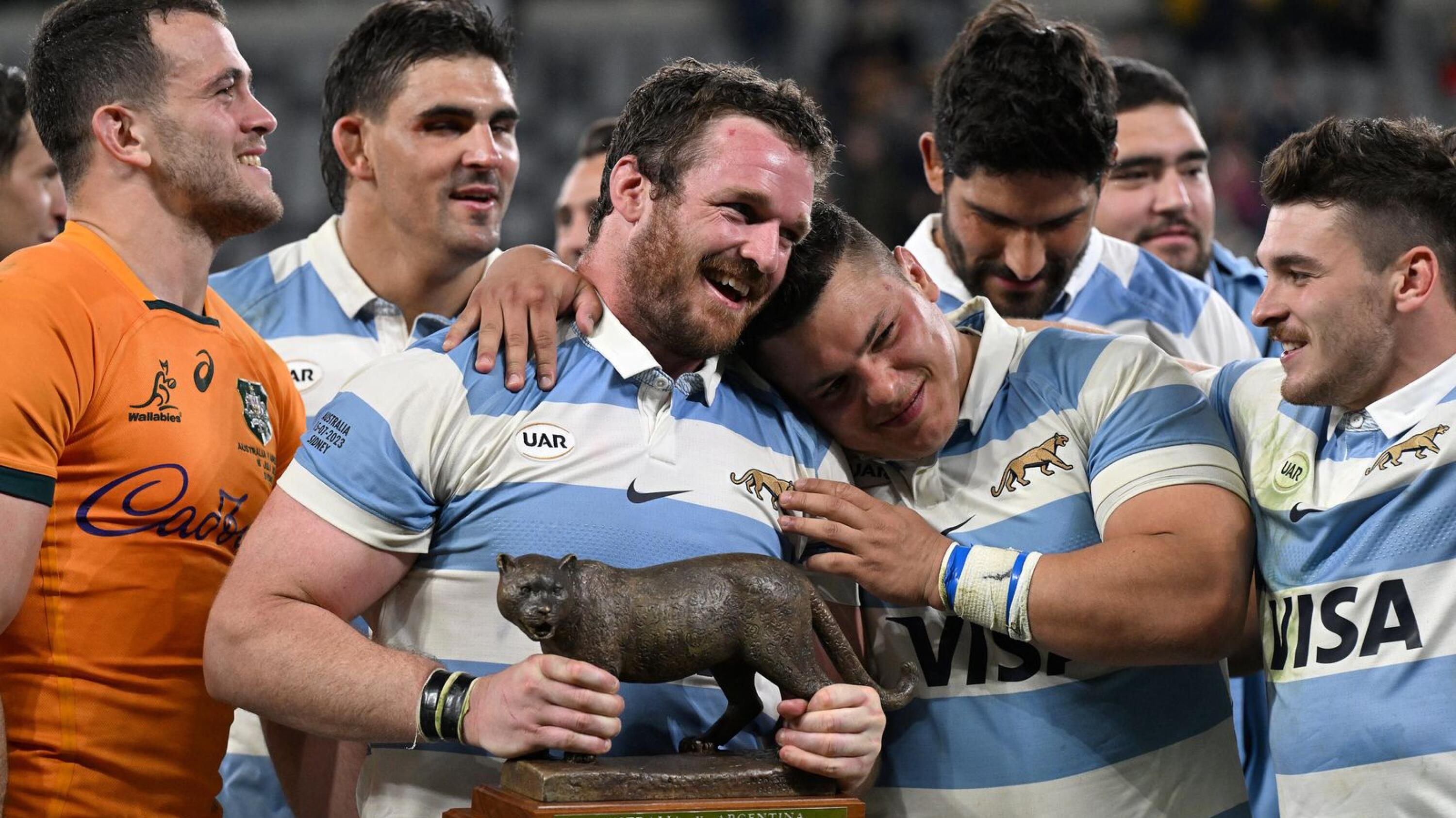 Argentina’s captain Julian Montoyo celebrates with teammates after the winning Puma Trophy after their Rugby Championship match against Australia at Commbank Stadium in Sydney on Saturday
