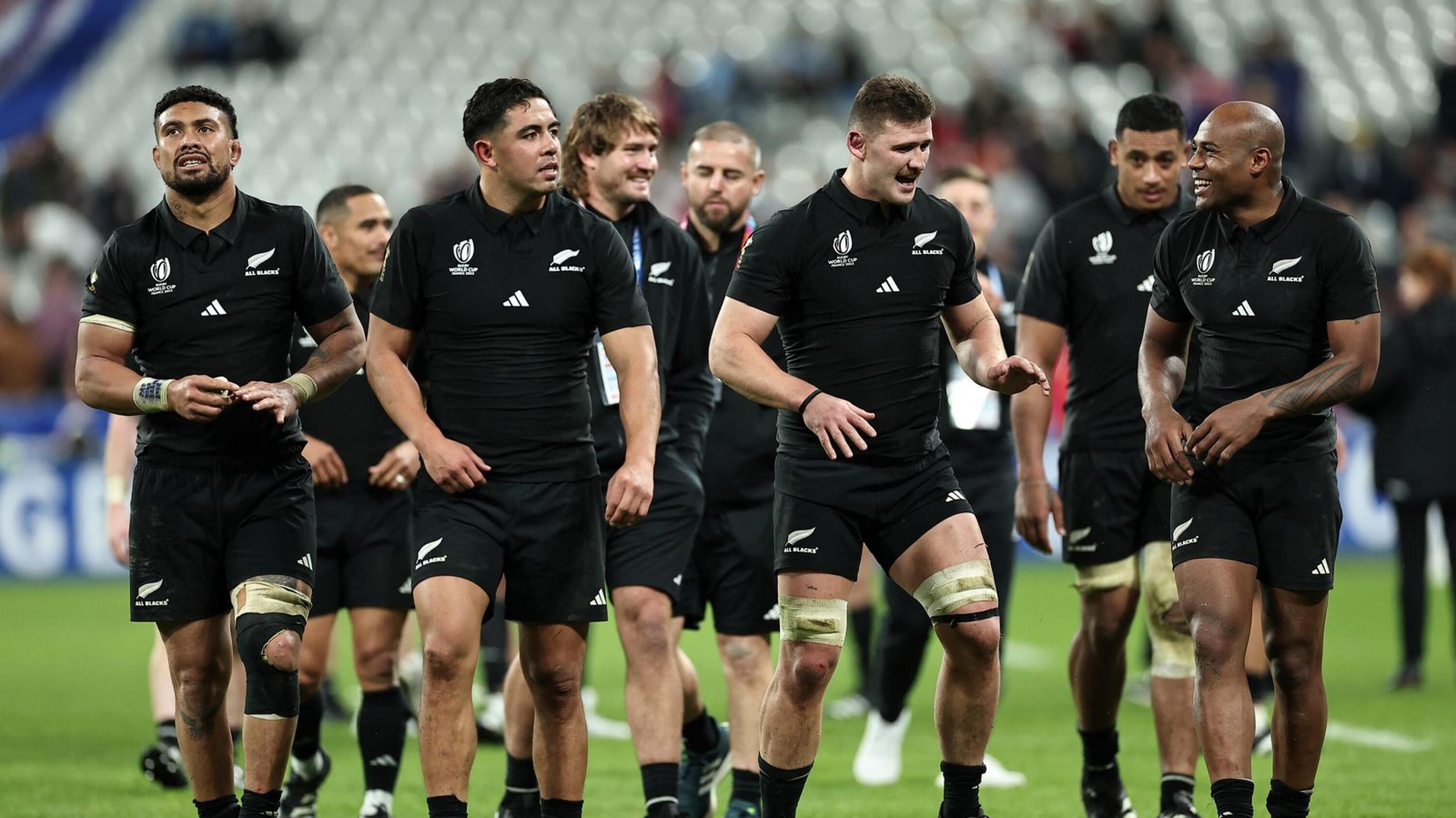 All Blacks players celebrate their Rugby World Cup semi-final victory over Argentina
