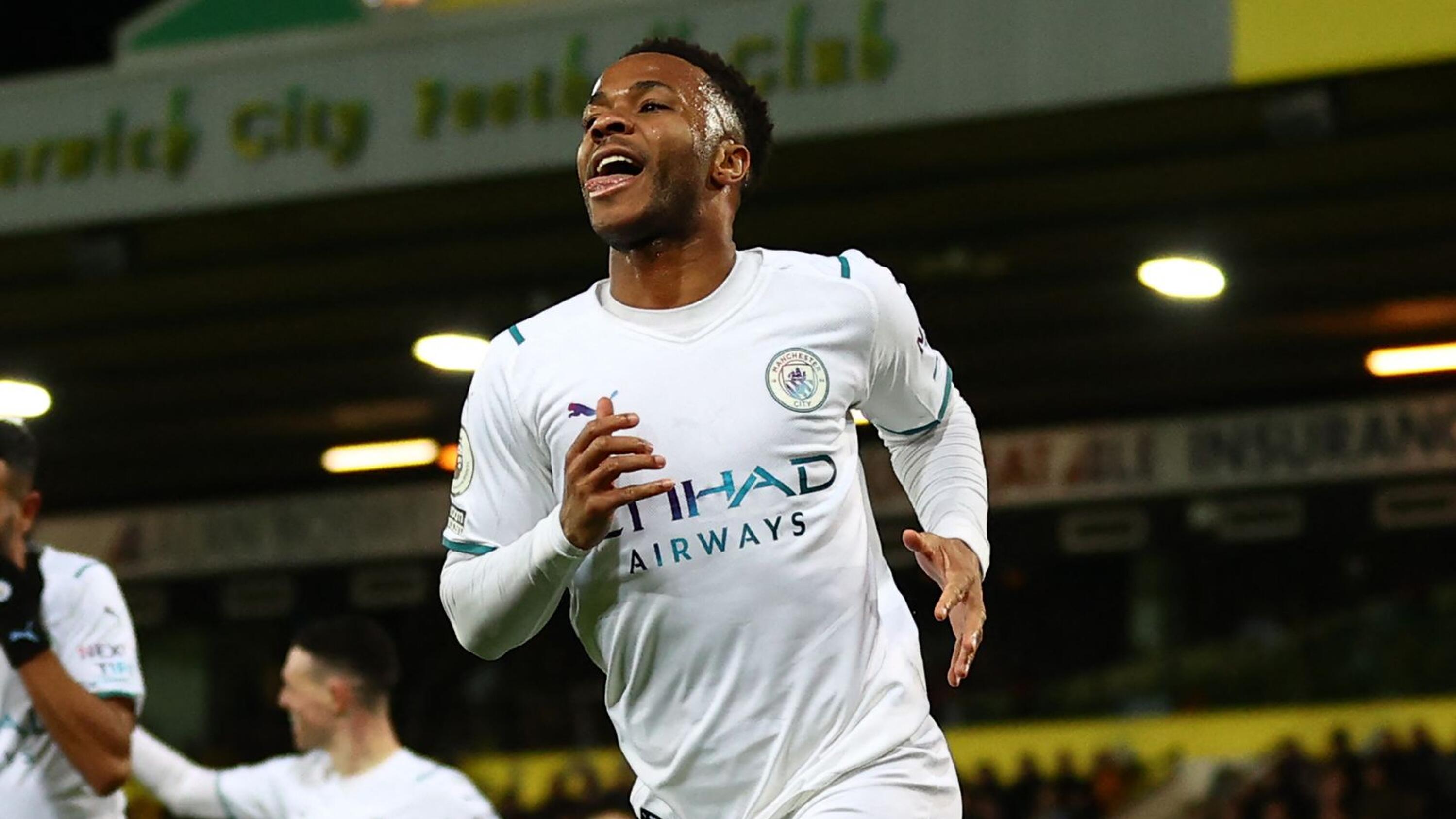 Manchester City's English midfielder Raheem Sterling celebrates after scoring the opening goal during their English Premier League football match against Norwich City at Carrow Road Stadium in Norwich on Saturday