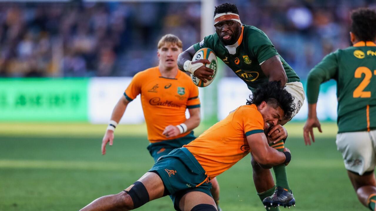 Siya Kolisi of the Springboks is tackled by Pete Samu of the Wallabies during the Rugby Championship Test match at Adelaide Oval in Adelaide, Australia
