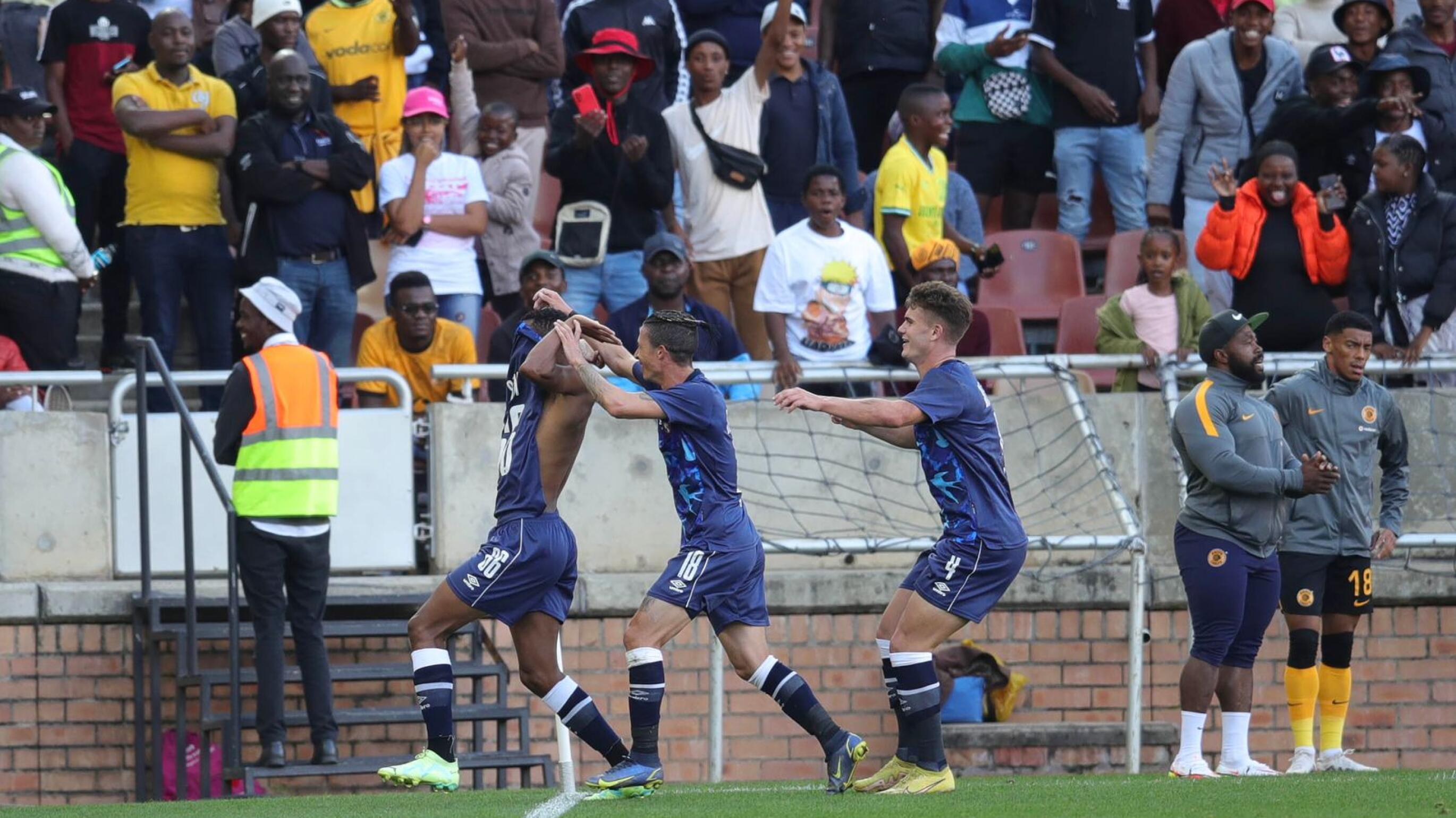 Swallows’ Bongani Sam celebrates with teammates after scoring against Chiefs on Monday.