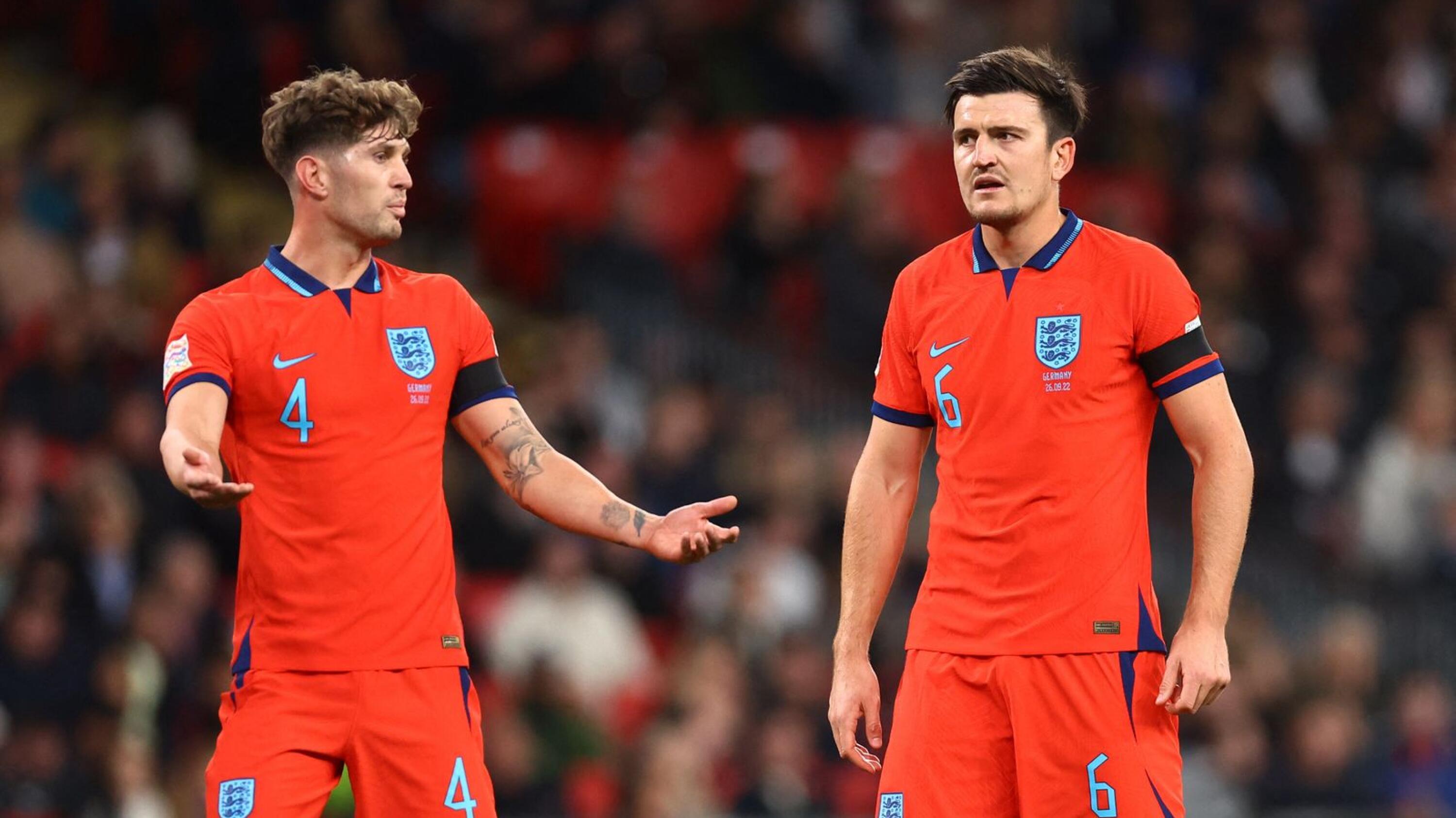 John Stones and Harry Maguire react during England’s friendly against Germany at Wembley on Monday.