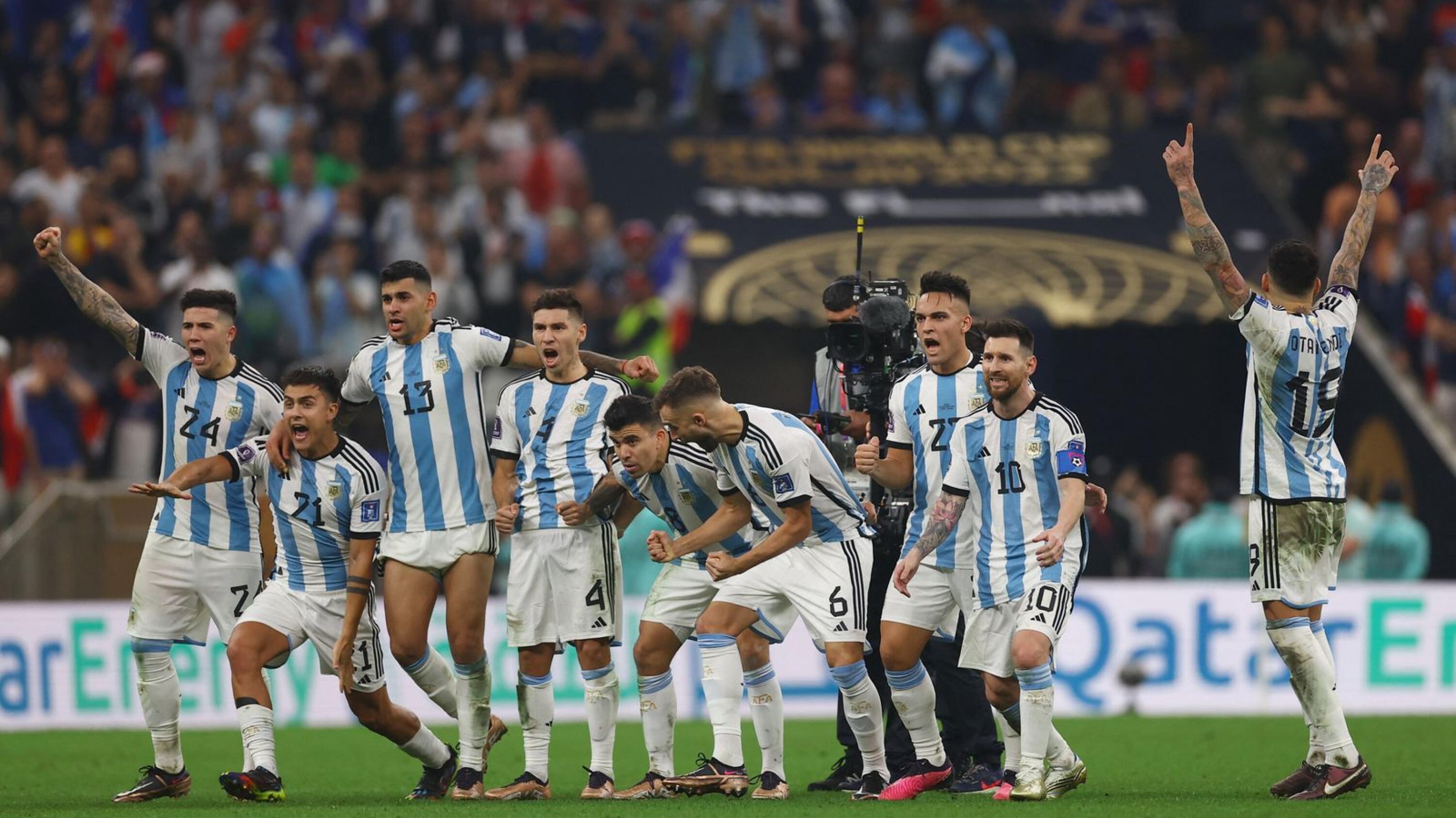 Argentina's Lionel Messi and teammates react after winning the penalty shootout in Sunday’s World Cup final against France in Lusail