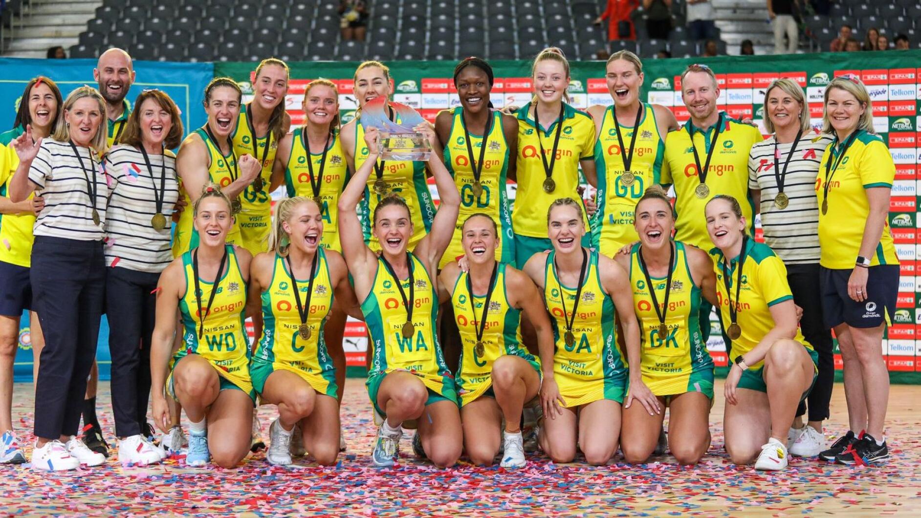 The triumphant Australia netball team with the Quad Series trophy