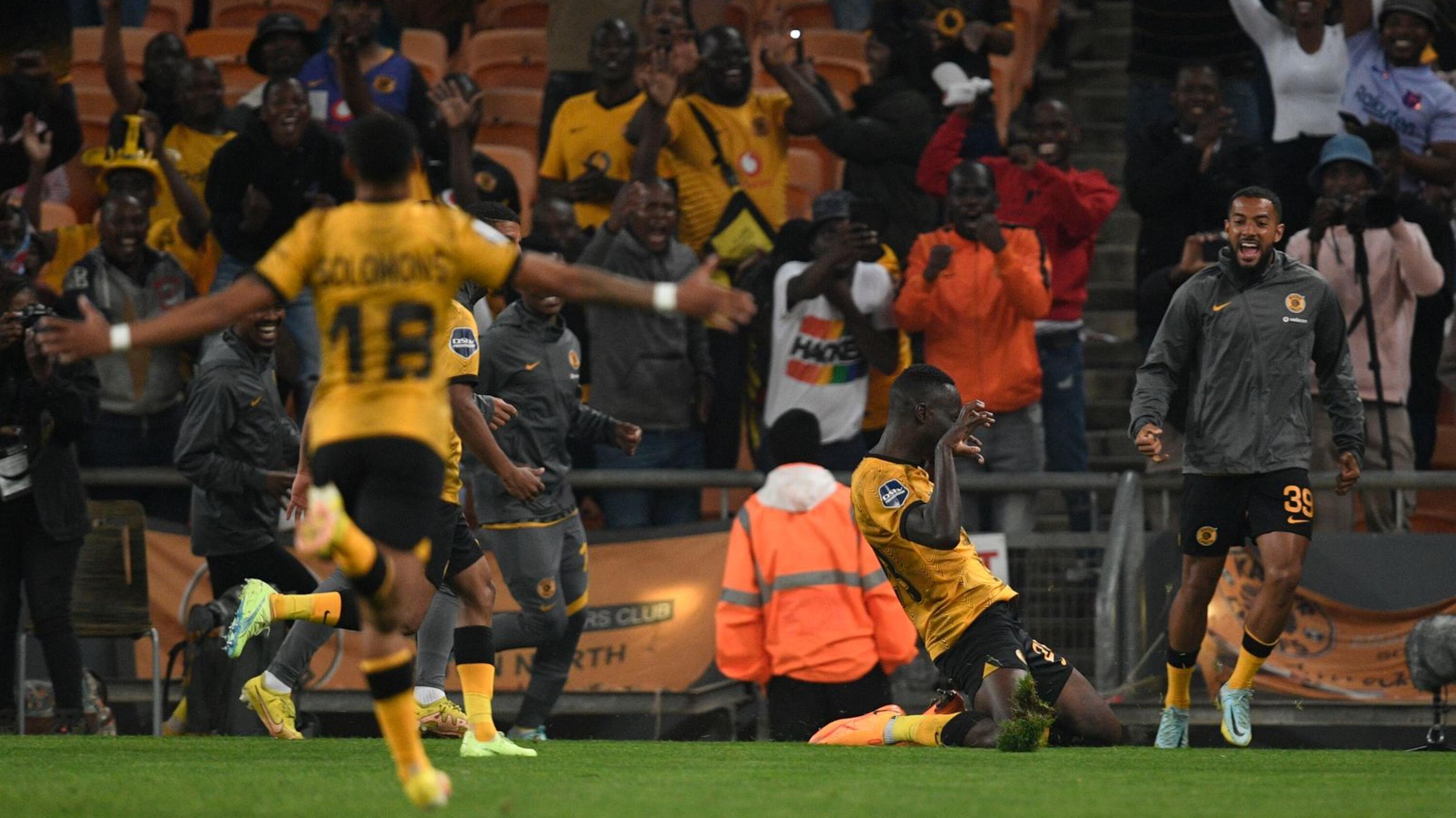 Caleb Bimenyimana of Kaizer Chiefs celebrates with teammates after scoring a goal during their DStv Premiership game against SuperSport United FC at FNB Stadium on Saturday
