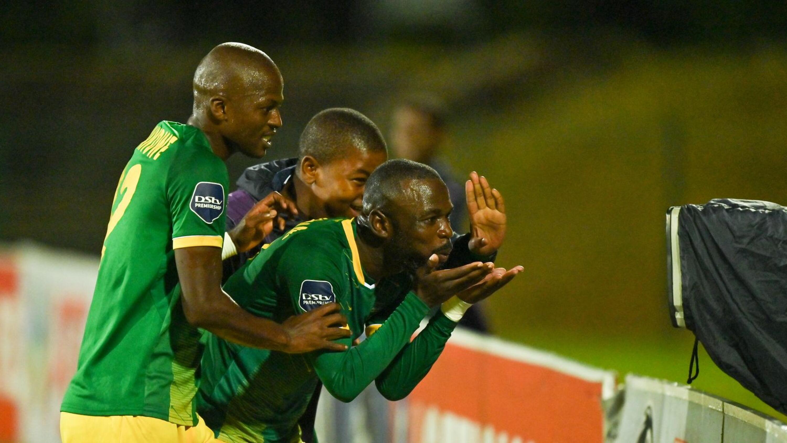 Velemseni Ndwandwe of Golden Arrows celebrates with Knox Mutizwa after another goal during their DStv Premiership game against Marumo Gallants FC at Princess Magogo Stadium in Durban on Wednesday