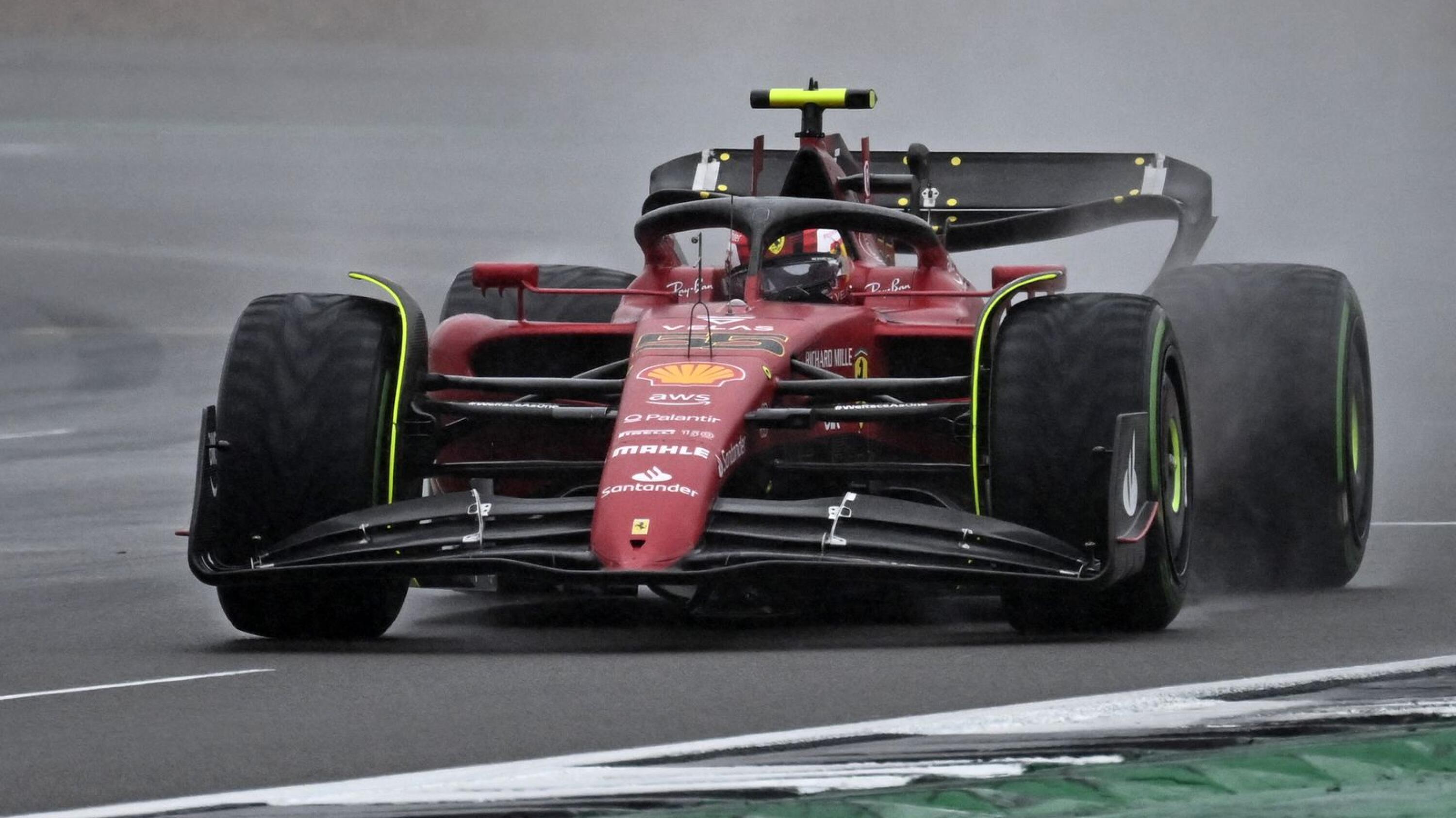 Ferrari's Spanish driver Carlos Sainz Jr finishes his lap during the third and final qualifying session to take pole position for the Formula One British Grand Prix at the Silverstone motor racing circuit in Silverstone