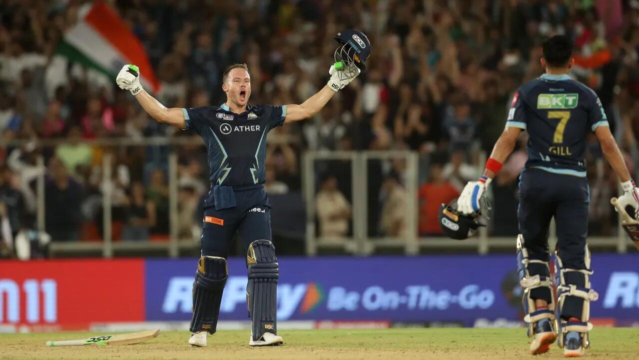 David Miller and Shubman Gill celebrate after Gujarat Titans beat Rajasthan Royals to win the Indian Premier League title at the Narendra Modi Stadium in Ahmedabad on Sunday evening