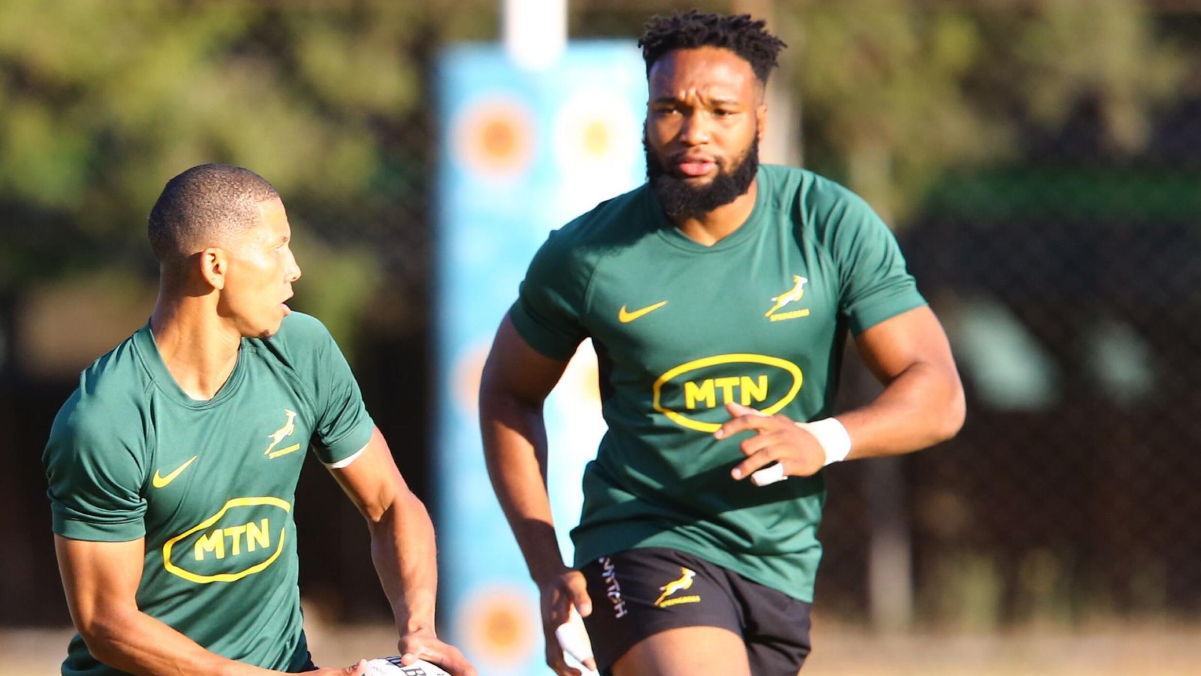 Lukhanyo Am in action with Manie Libbok during a Springbok training session