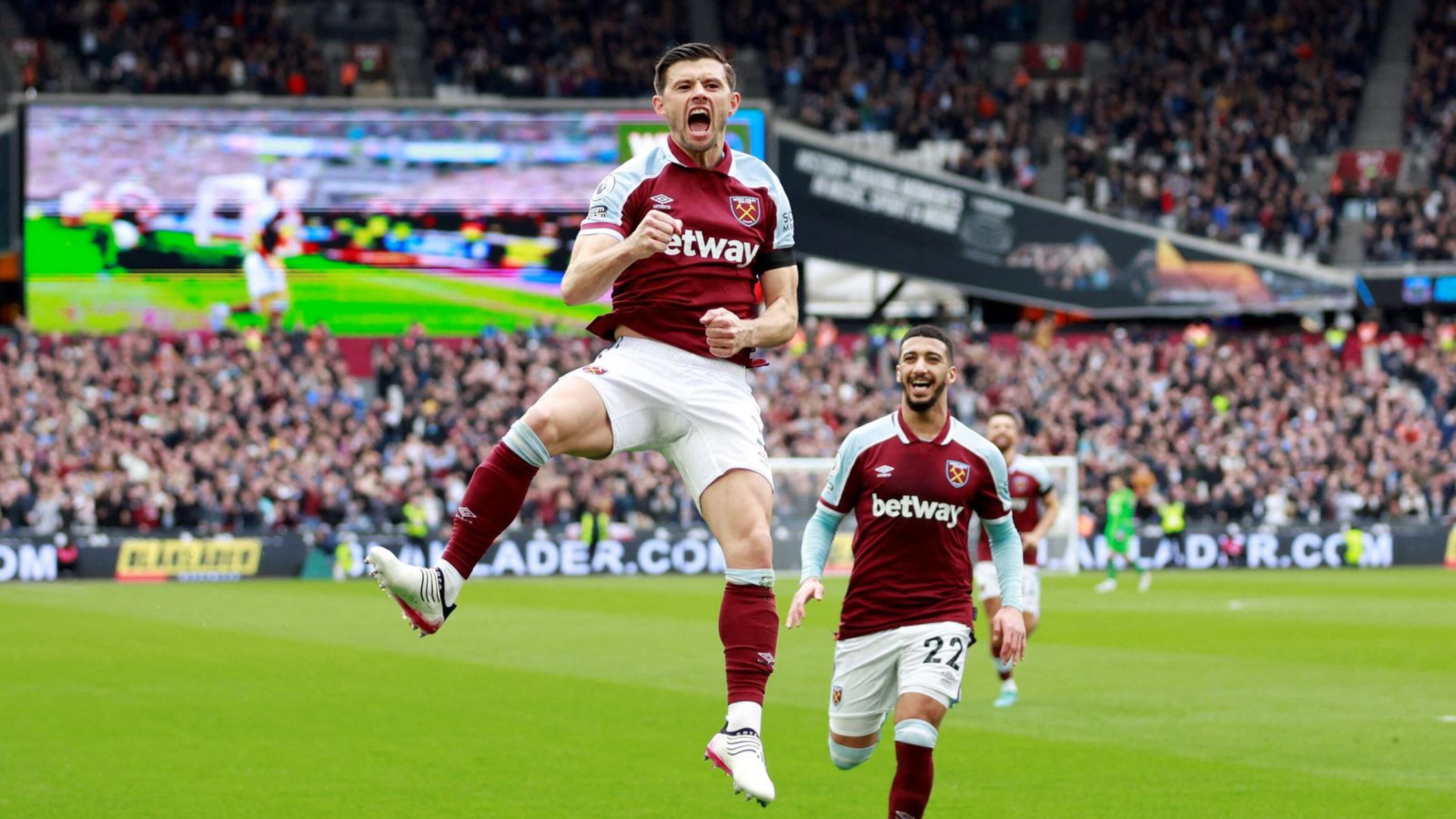 West Ham United's Aaron Cresswell celebrates with Said Benrahma after scoring their first goal during their Premier League game against Everton at London Stadium on Sunday