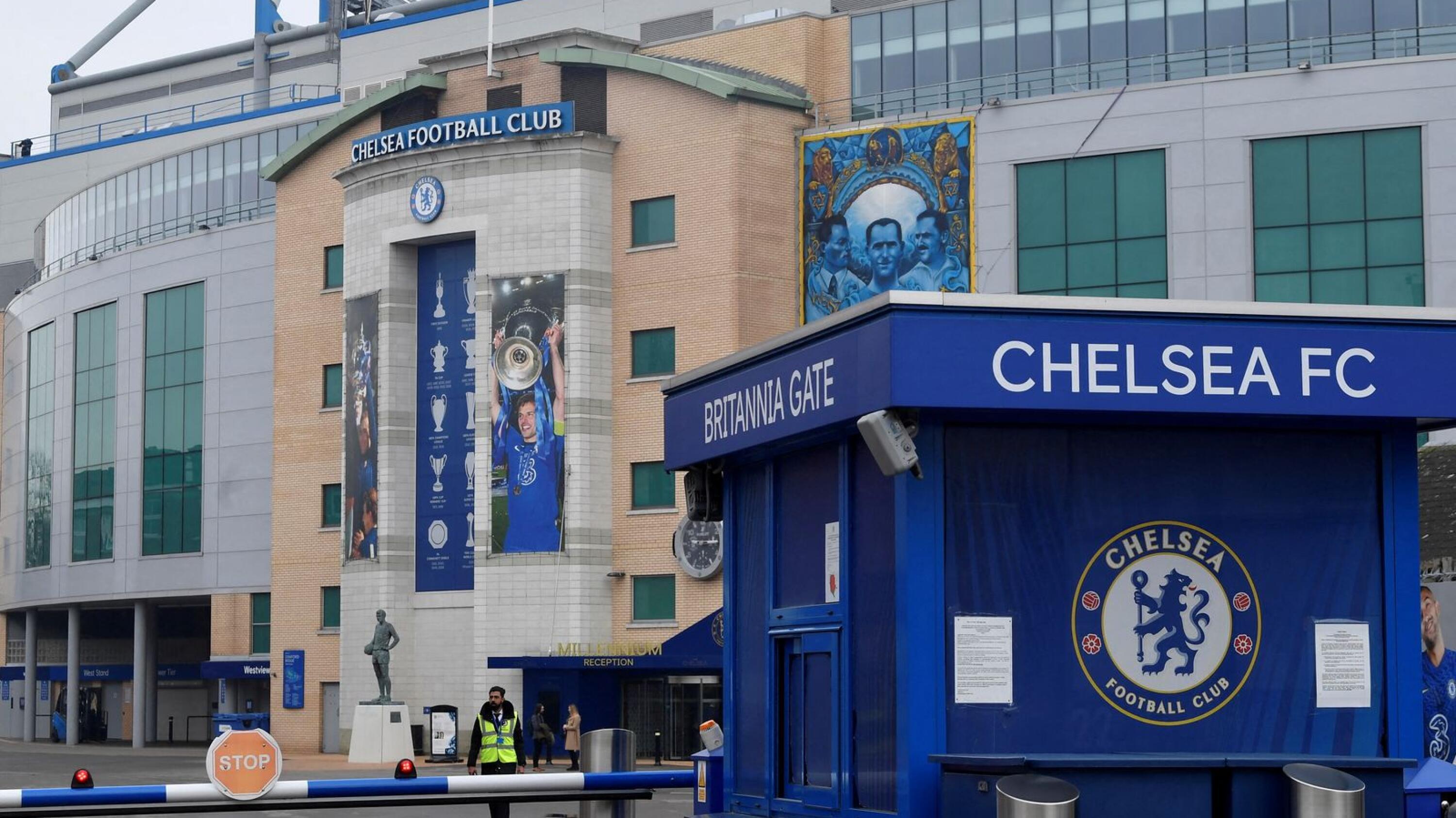 A security officer patrols at Stamford Bridge, the stadium for Chelsea Football Club, after Russian businessman Roman Abramovich said he would sell Chelsea, 19 years after buying it, amid growing pressure for oligarchs to be hit by sanctions after Russia's invasion of Ukraine
