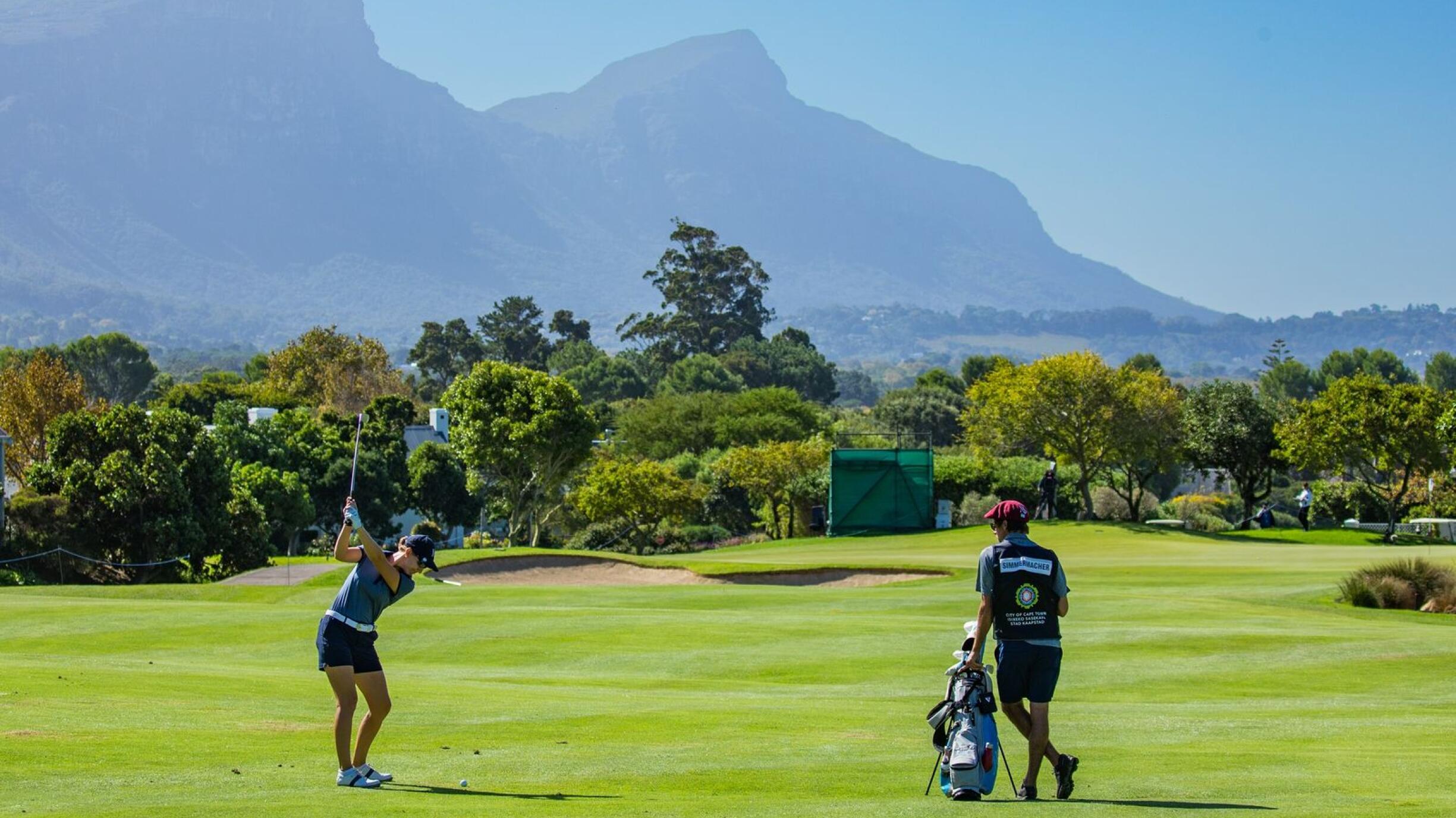 A women’s golfer in action at Steenberg Golf Club 