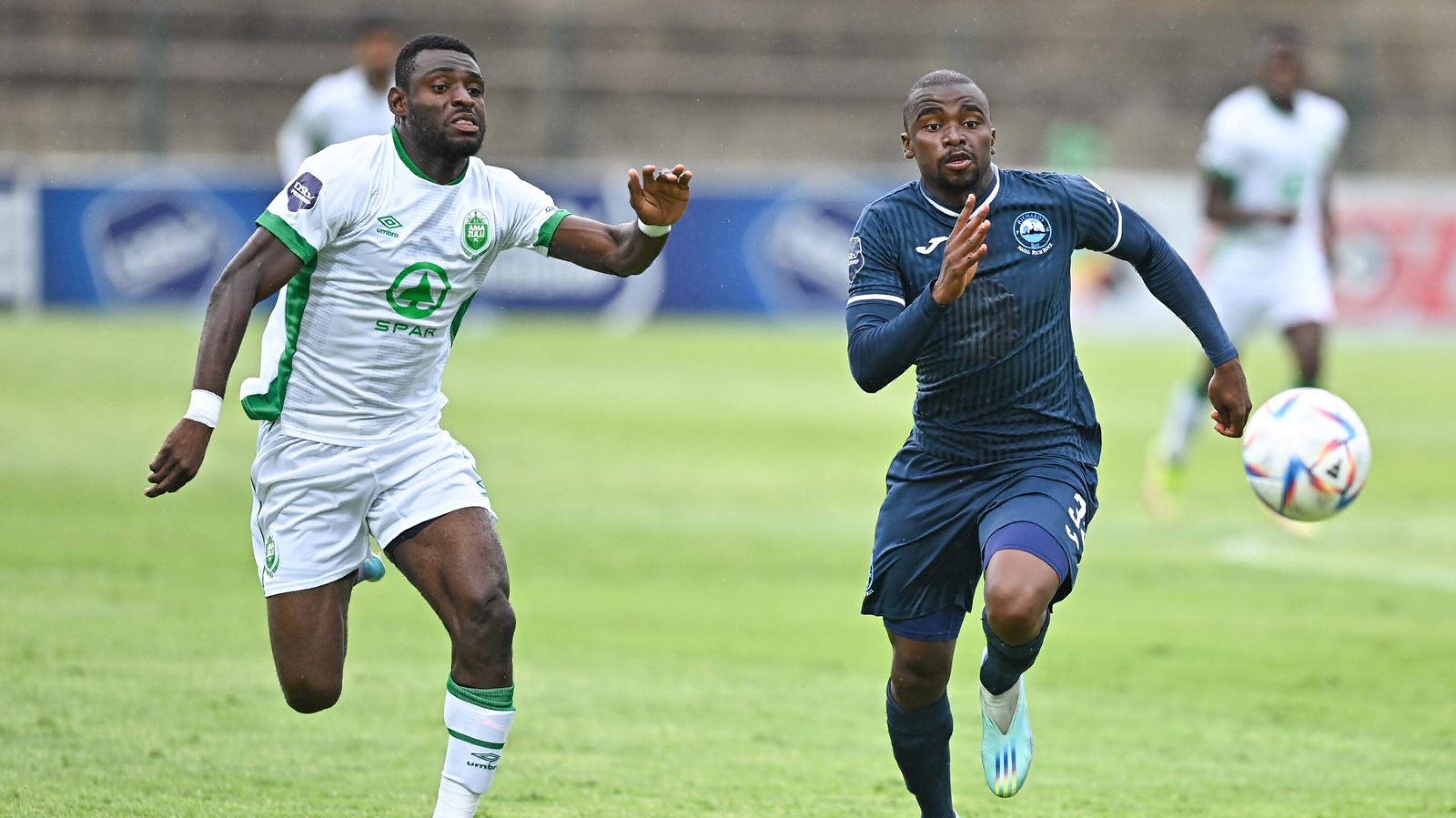 Junior Dion of AmaZulu FC fights Khetha Shabalala of Richards Bay FC for the ball during their DStv Premiership clash at King Goodwill Zwelithini Stadium in Durban on Sunday