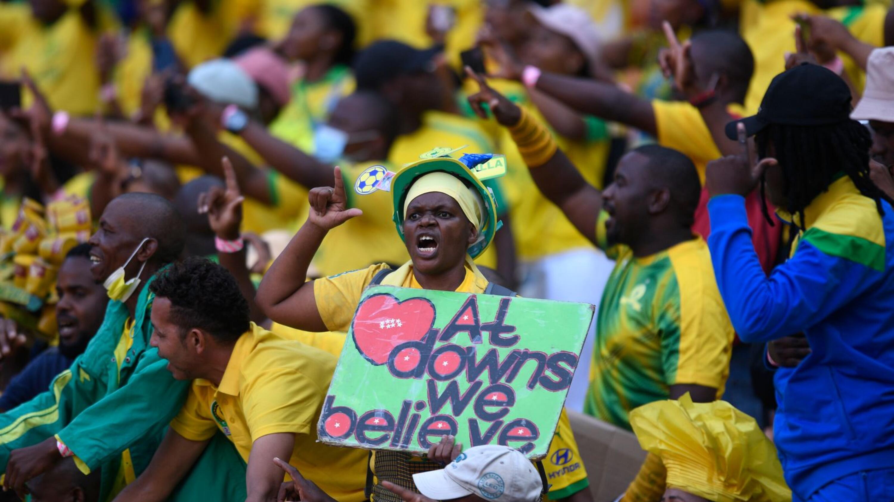 Mamelodi Sundowns supporters celebrate in the stands during their CAF Champions League match against Al Ahly at FNB Stadium in Soweto on Saturday