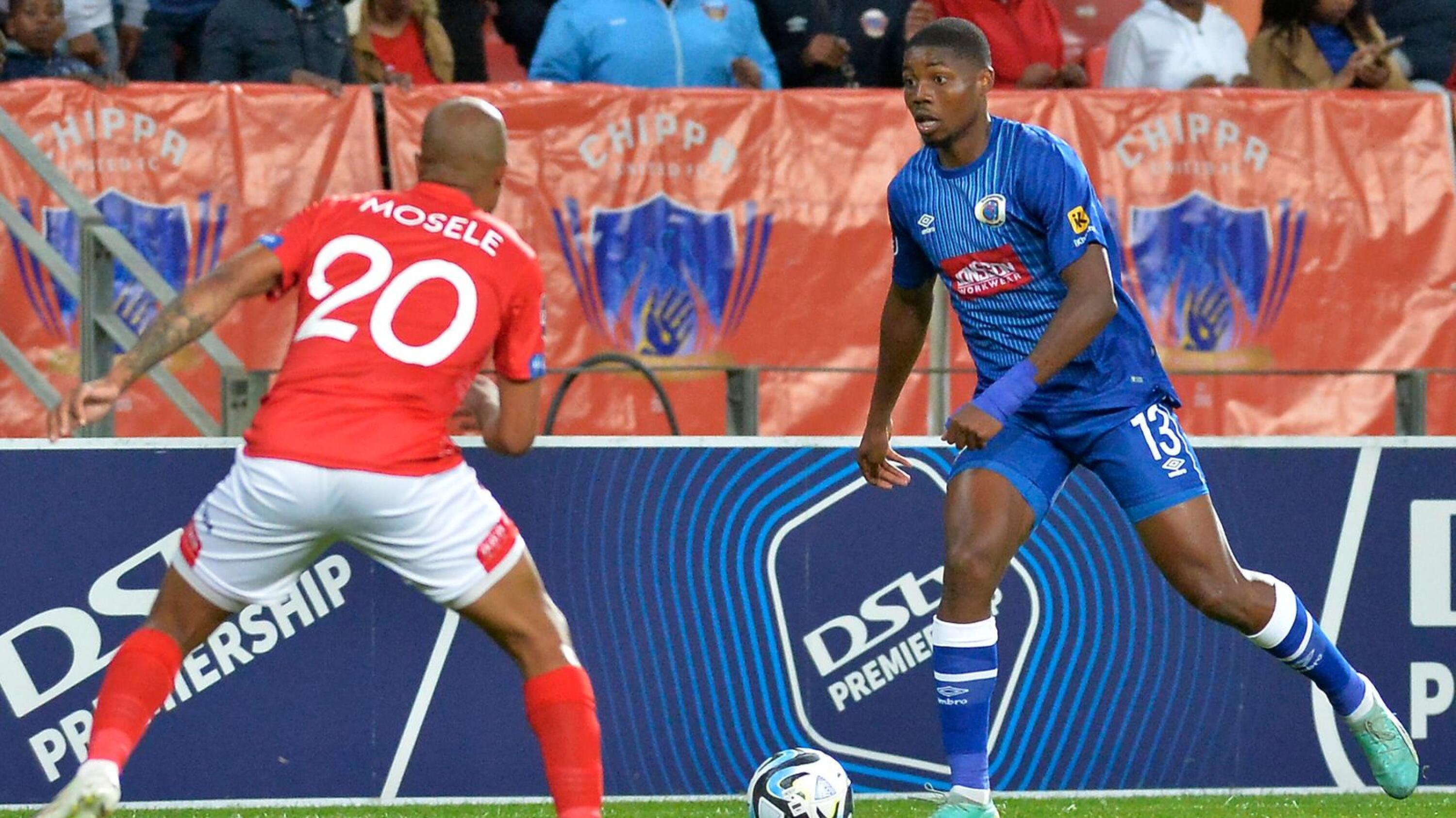 Goodman Mosele of Chippa United and Ime Okonof Supersport United fight for the ball during their DStv Premiership game at Nelson Mandela Bay Stadium in Gqeberha on Tuesday