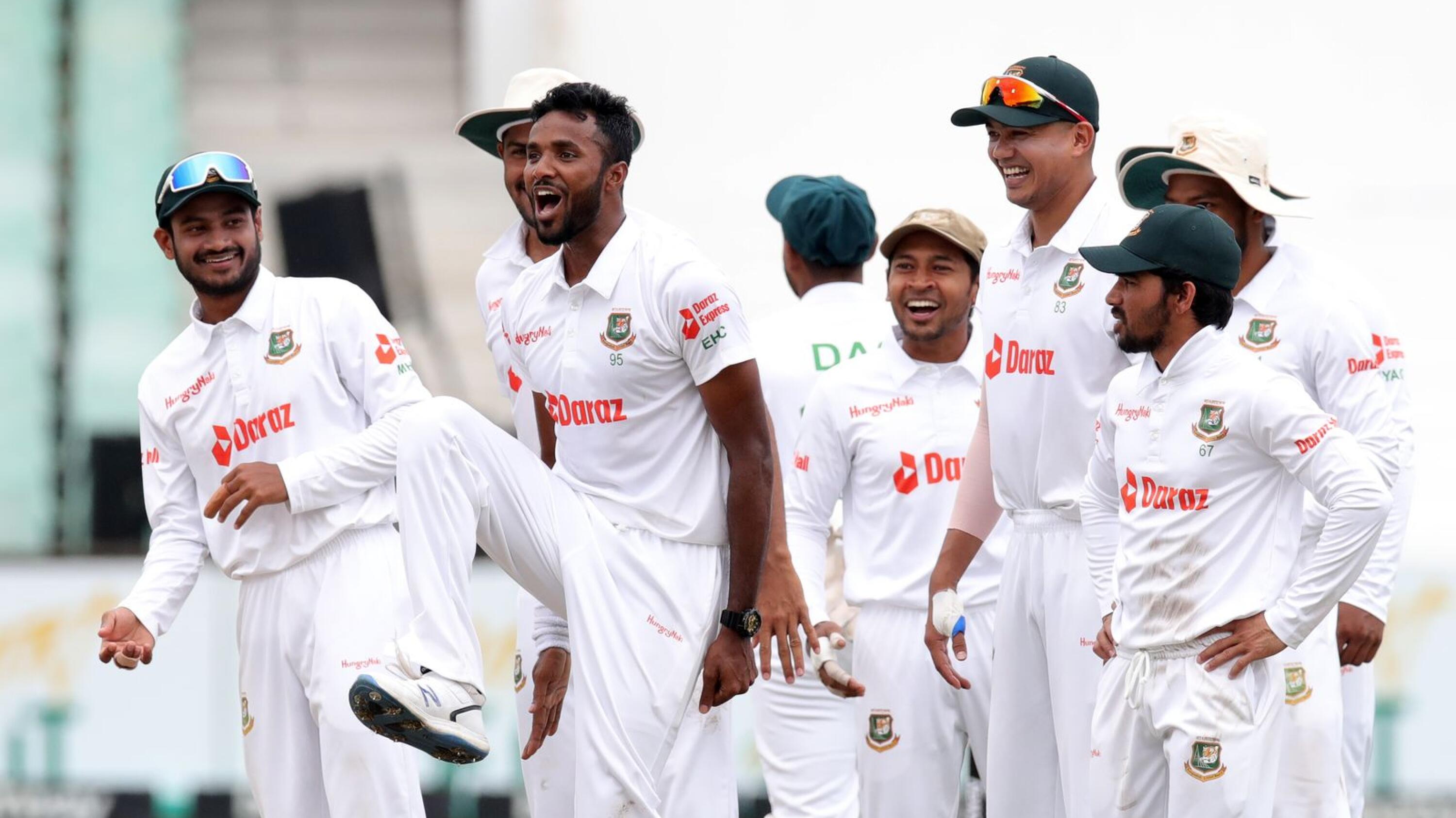 Ebadot Hossain of Bangladesh celebrates with teammates after picking up the wicket of Sarel Erwee of the Proteas during day four of the first Test at Kingsmead Stadium in Durban on Sunday