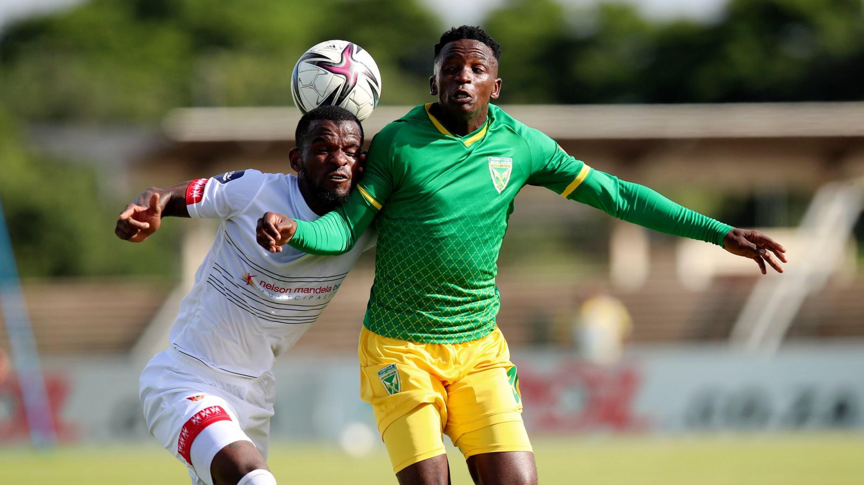 Tebogo Makobela of Chippa United is challenged by Sbonelo Cele of Golden Arrows during their DStv Premiership match at Princess Magogo Stadium in KwaMashu, Durban on Sunday