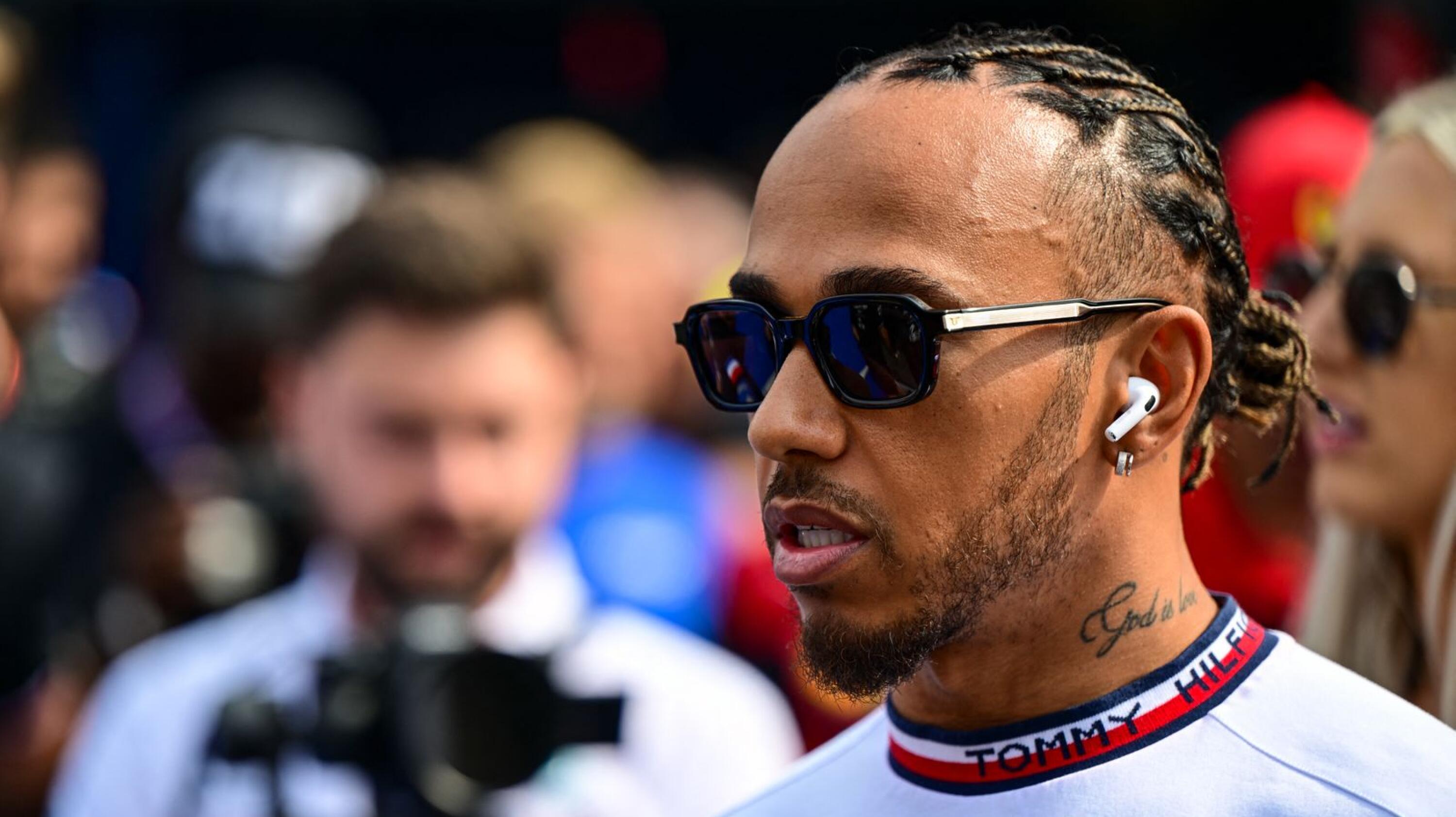 Mercedes' British driver Lewis Hamilton arrives for the drivers' parade ahead of the Dutch Formula One Grand Prix at the Zandvoort circuit