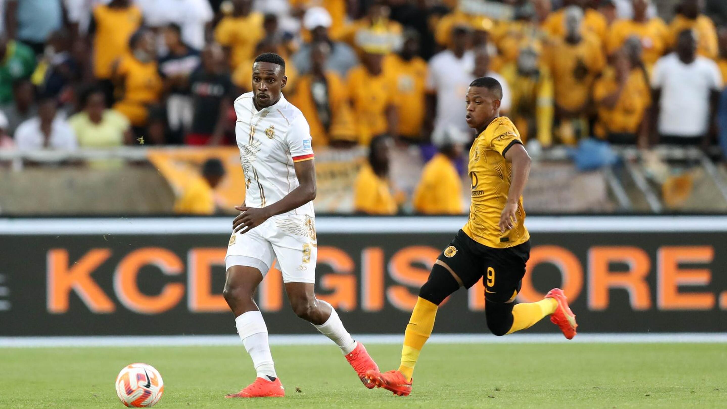 Mxolisi Macuphu of Royal AM is challenged by Ashley Du Preez of Kaizer Chiefs during their Dstv Premiership match at Peter Mokaba Stadium in Polokwane on Sunday