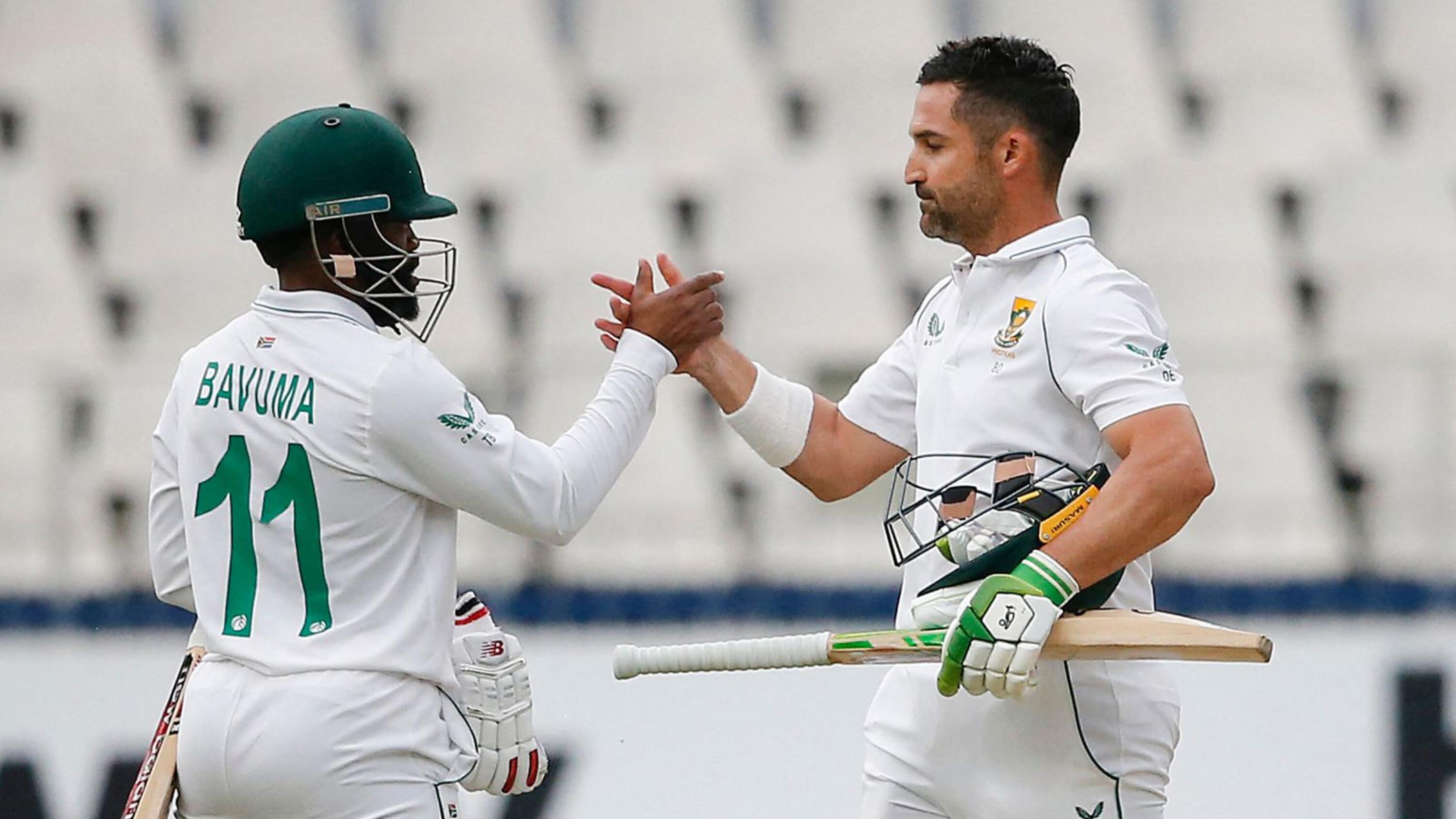 South Africa's Temba Bavuma shakes hands with captain Dean Elgar winning the second Test against India at the Wanderers in Johannesburg on Thursday