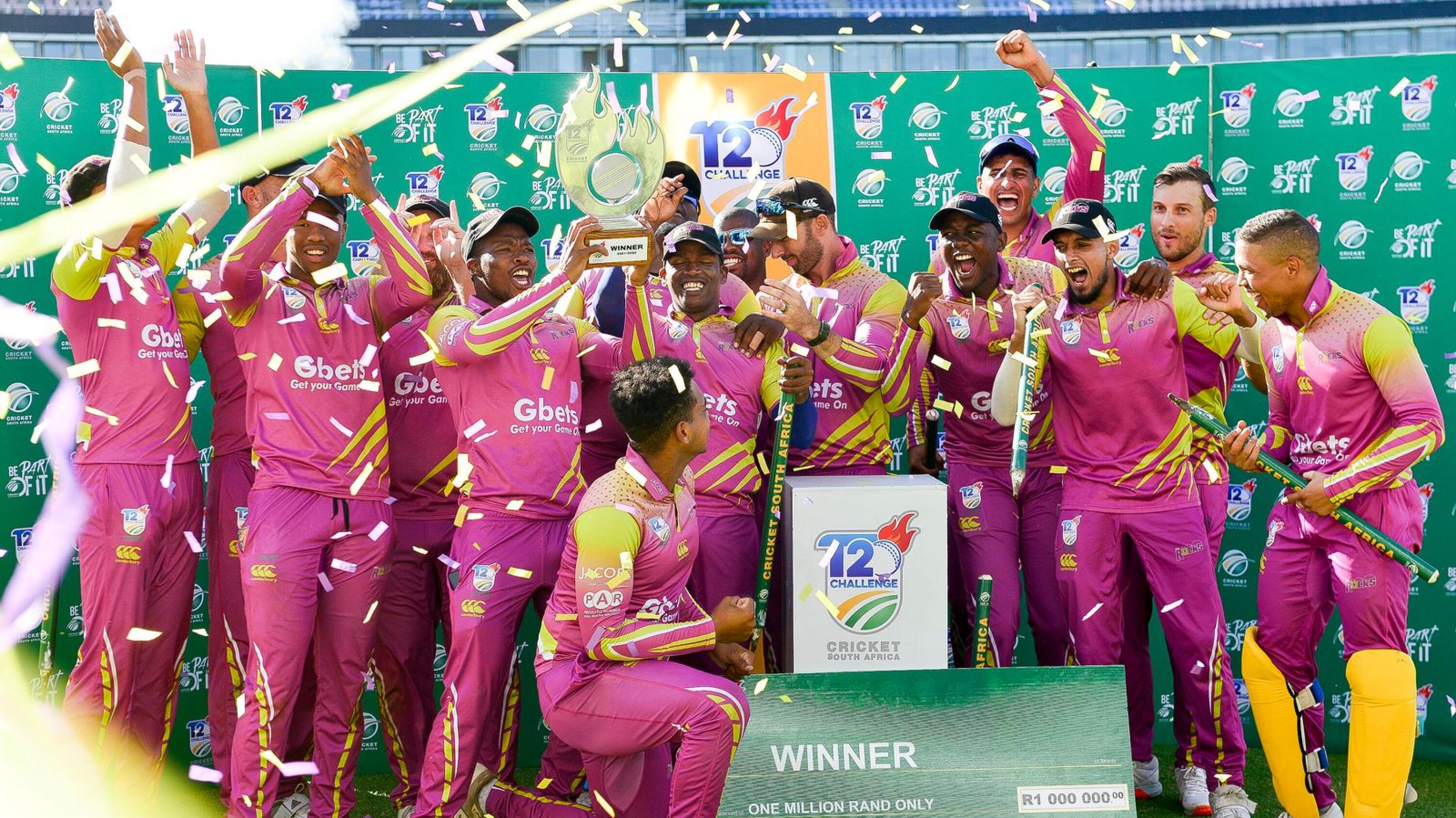 Rocks players celebrate with the trophy after beating the Titans in the fina of the CSA T20 Challenge at St George’s Park in Gqeberha