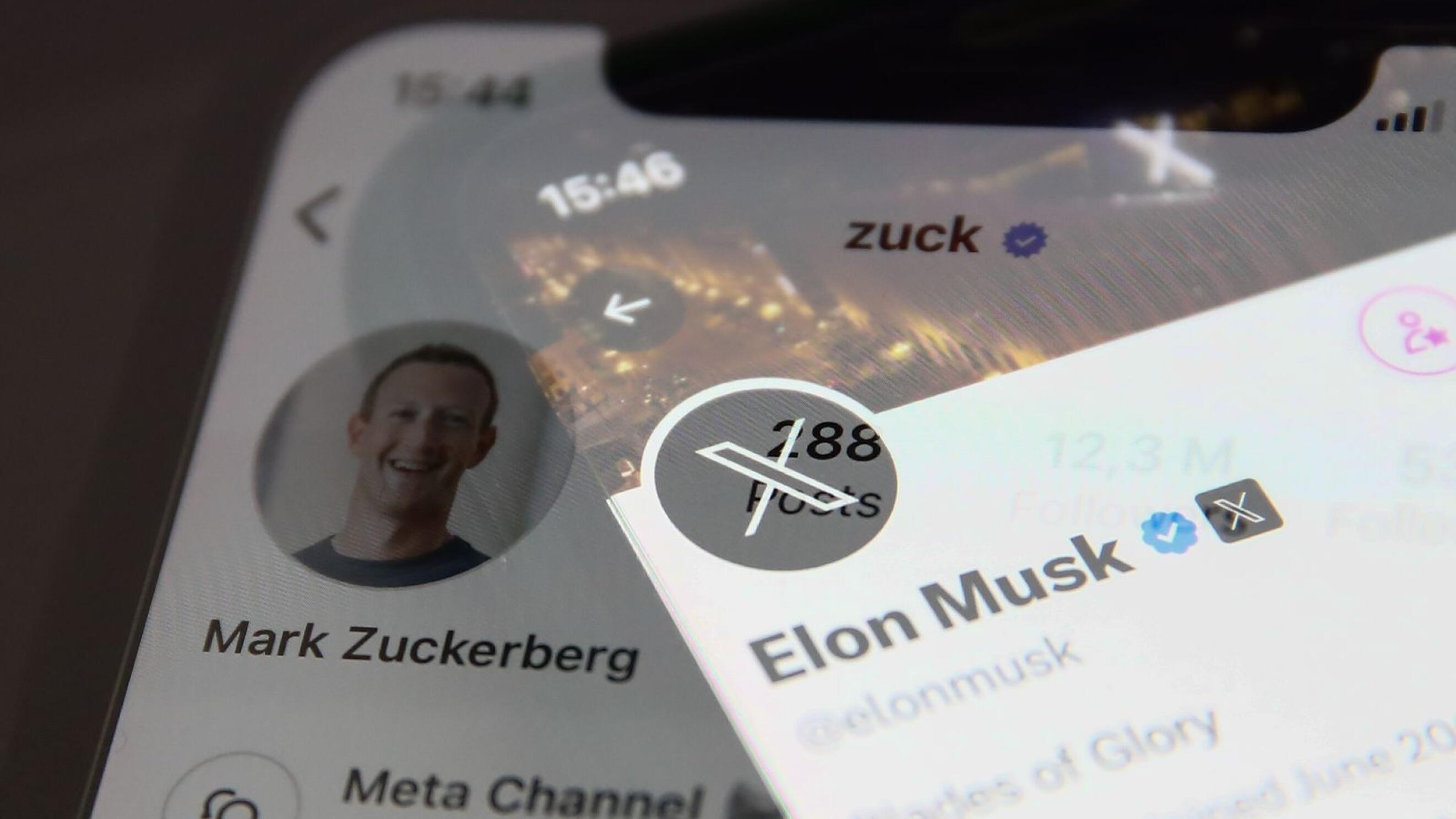 Mark Zuckerberg account on Instagram and Elon Musk account on X displayed on a phone screen