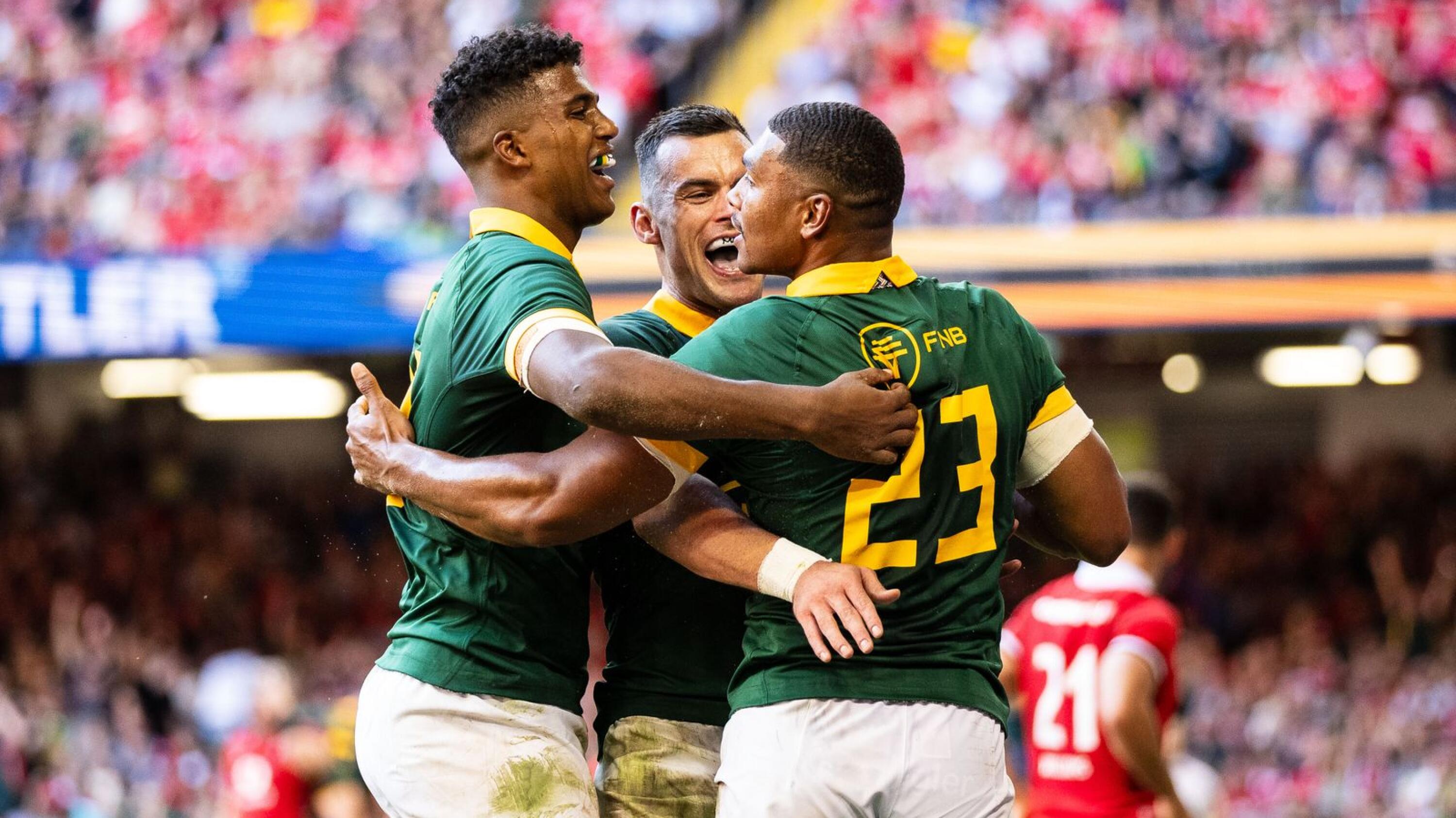 Damian Willemse of South Africa celebrates scoring his sides eighth try with team-mates Jesse Kriel & Canan Moodie during the Summer Nations Series 2023, Rugby Union Friendly match between Wales and South Africa on 19 August 2023 at Principality Stadium in Cardiff, Wales