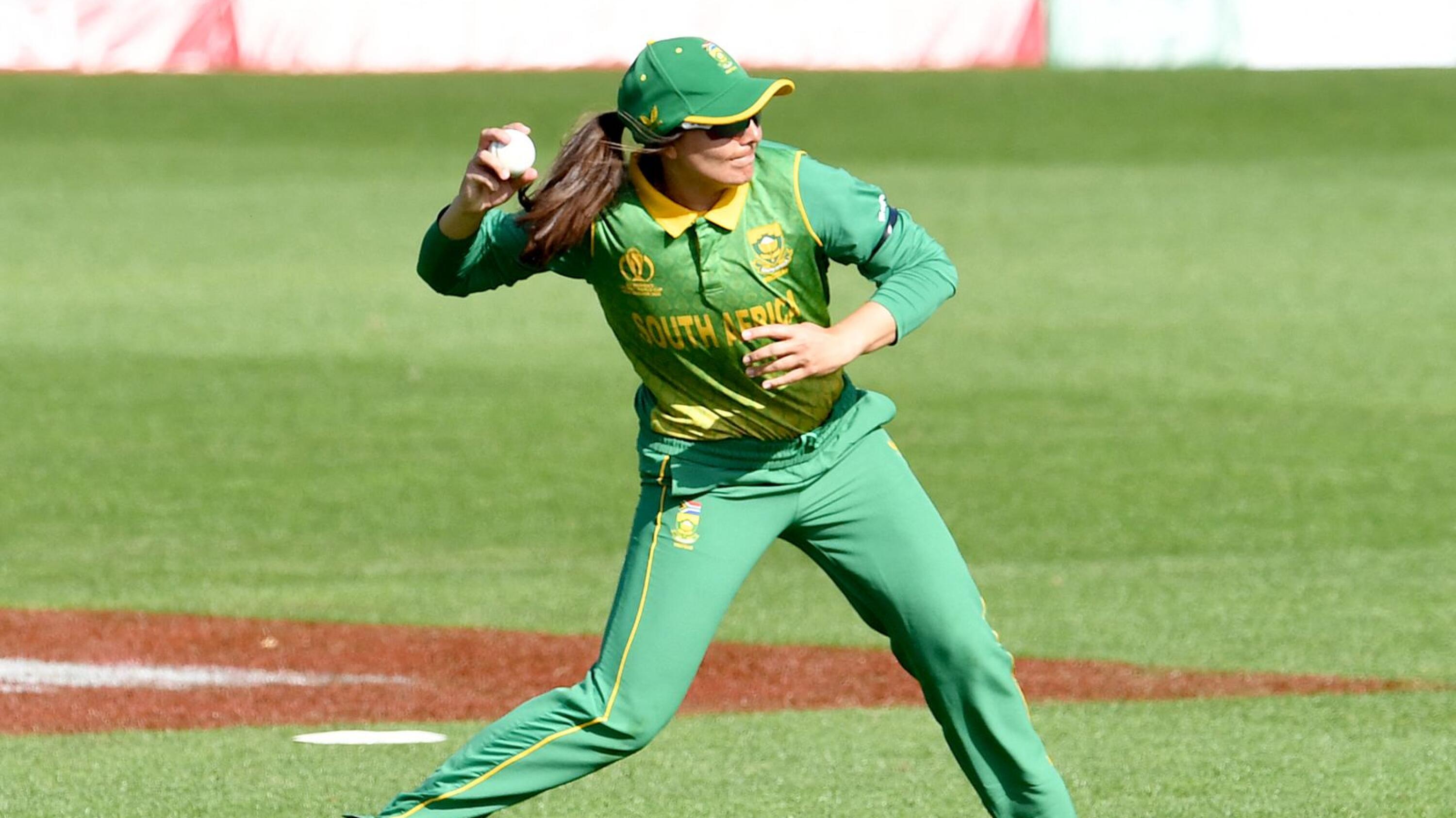 South Africa's Sune Luus throws the ball during their Round 1 Women's Cricket World Cup match against Bangladesh at University Oval in Dunedin on March 5, 2022
