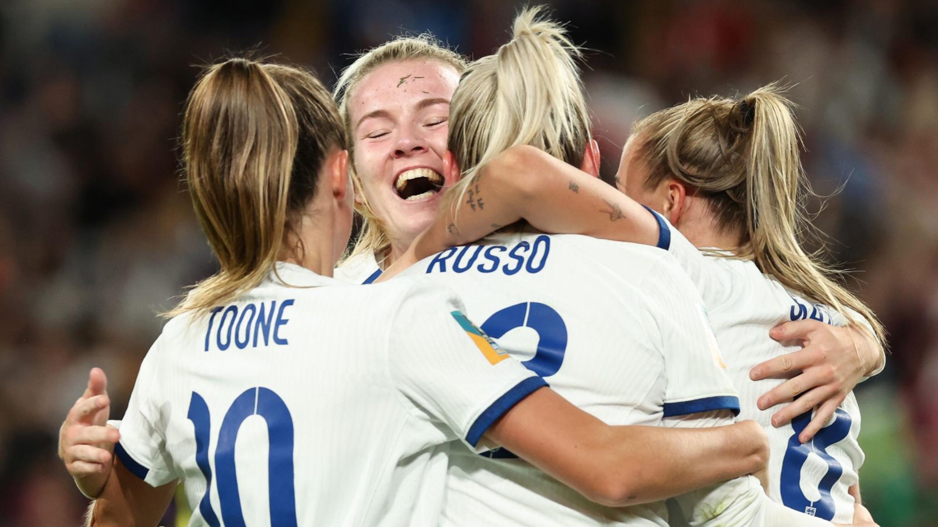 England's Alessia Russo celebrates with teammates after scoring a goal during their 2023 Women's World Cup quarter-final against Colombia at Stadium Australia in Sydney on Saturday