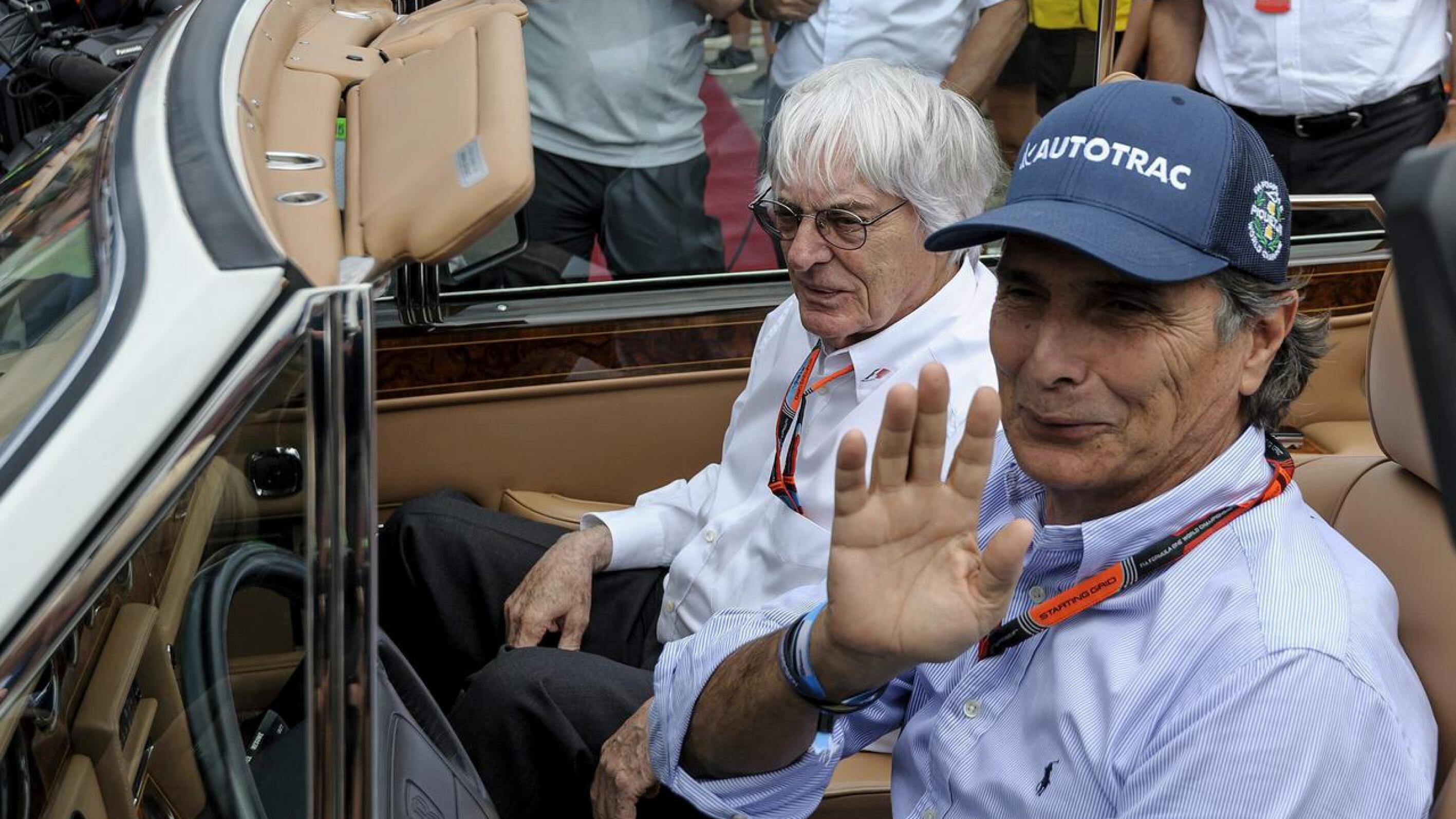 Former Brazilian Formula One driver Nelson Piquet with the sport’s former boss Bernie Ecclestone