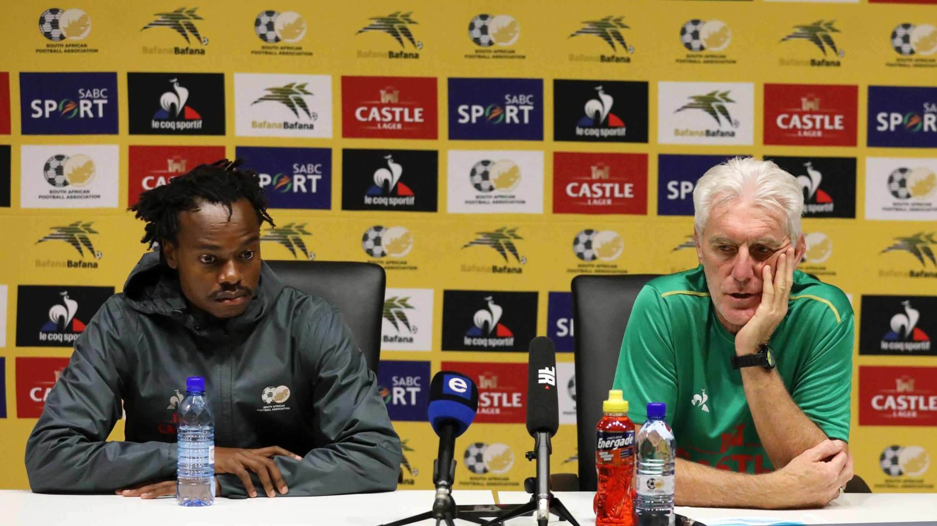 Percy Tau with Hugo Broos, coach of South Africa, during a press conference