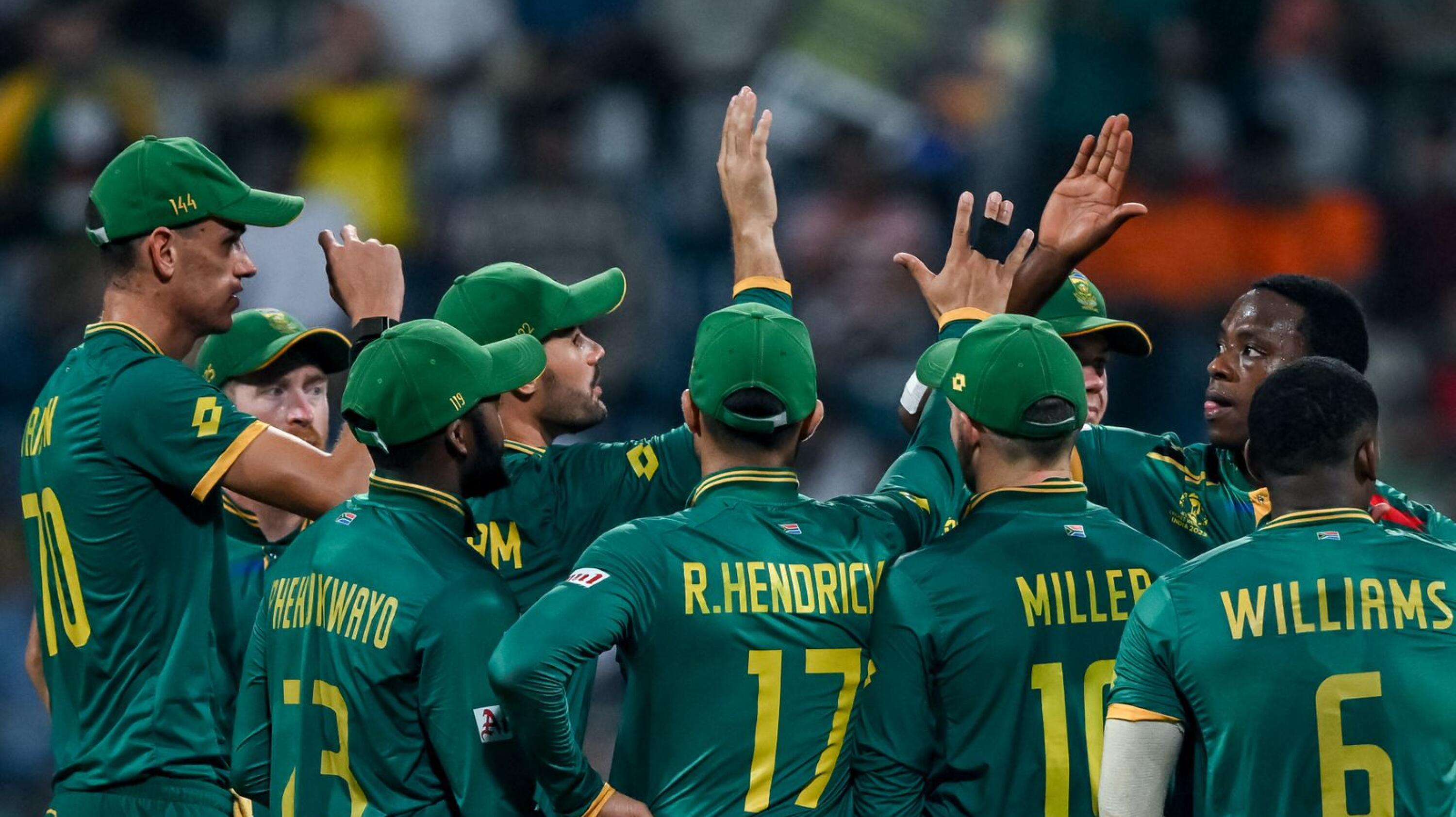 South Africa's Kagiso Rabada celebrates with teammates after taking the wicket of Bangladesh's Liton Das during their Cricket World Cup match