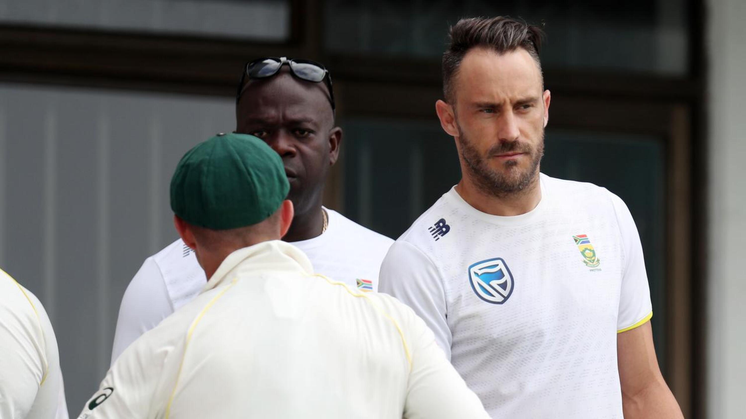 Proteas skipper Faf du Plessis shakes hands with David Warner after the conclusion of the 2018 Durban Test match