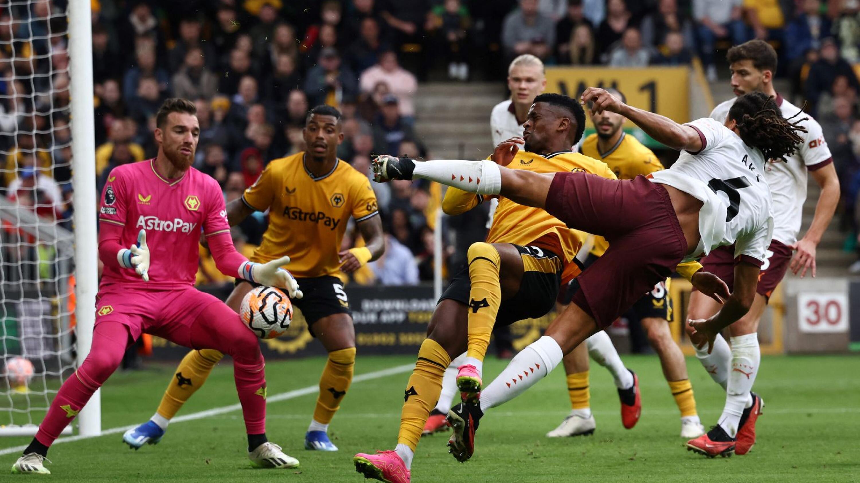 Manchester City's Nathan Ake shoots the ball but it's stopped by Wolverhampton Wanderers' Jose Sa