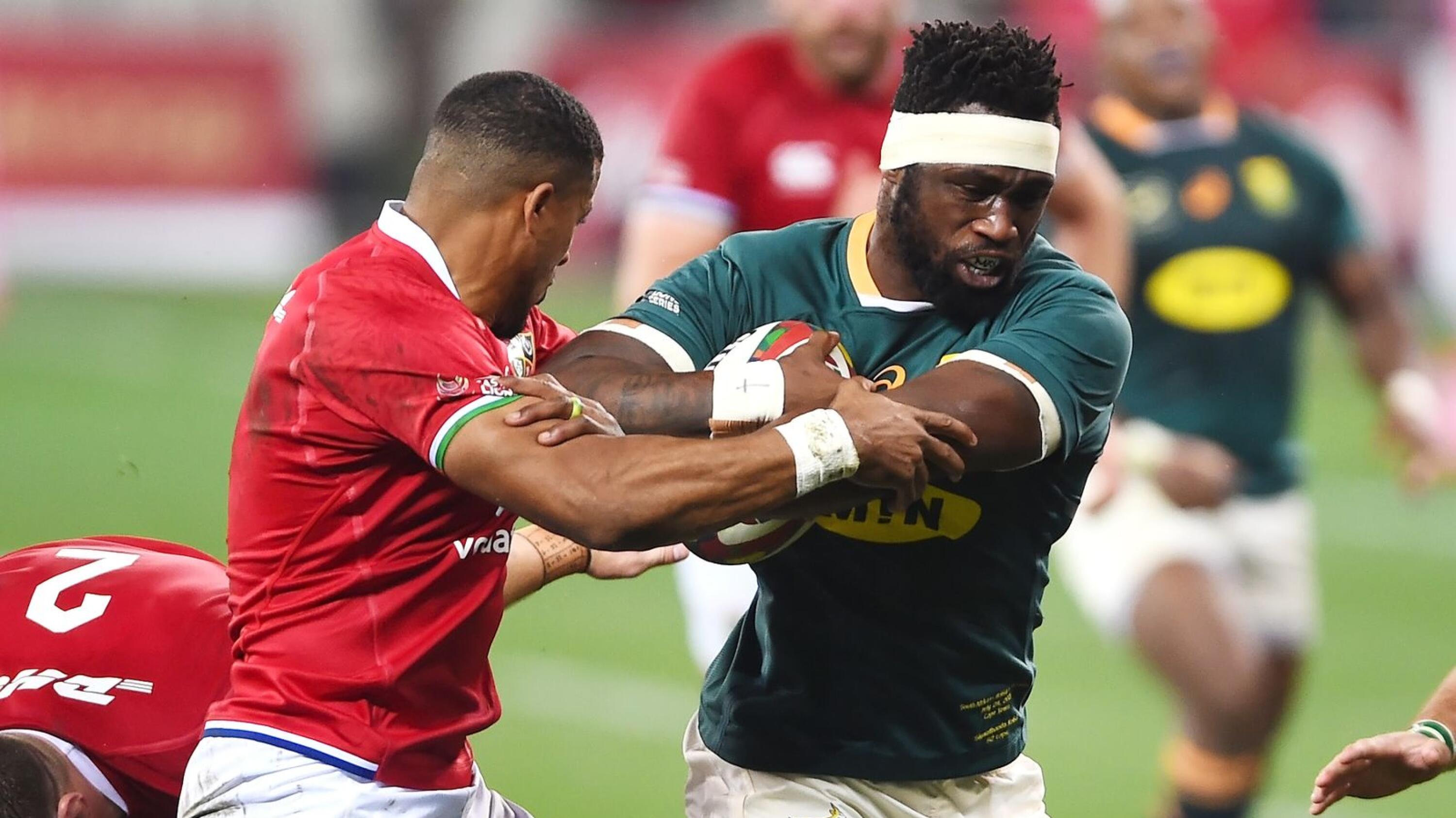Springboks captain Siya Kolisi is tackled by Anthony Watson of the British & Irish Lions during their first Test at the Cape Town Stadium on Saturday