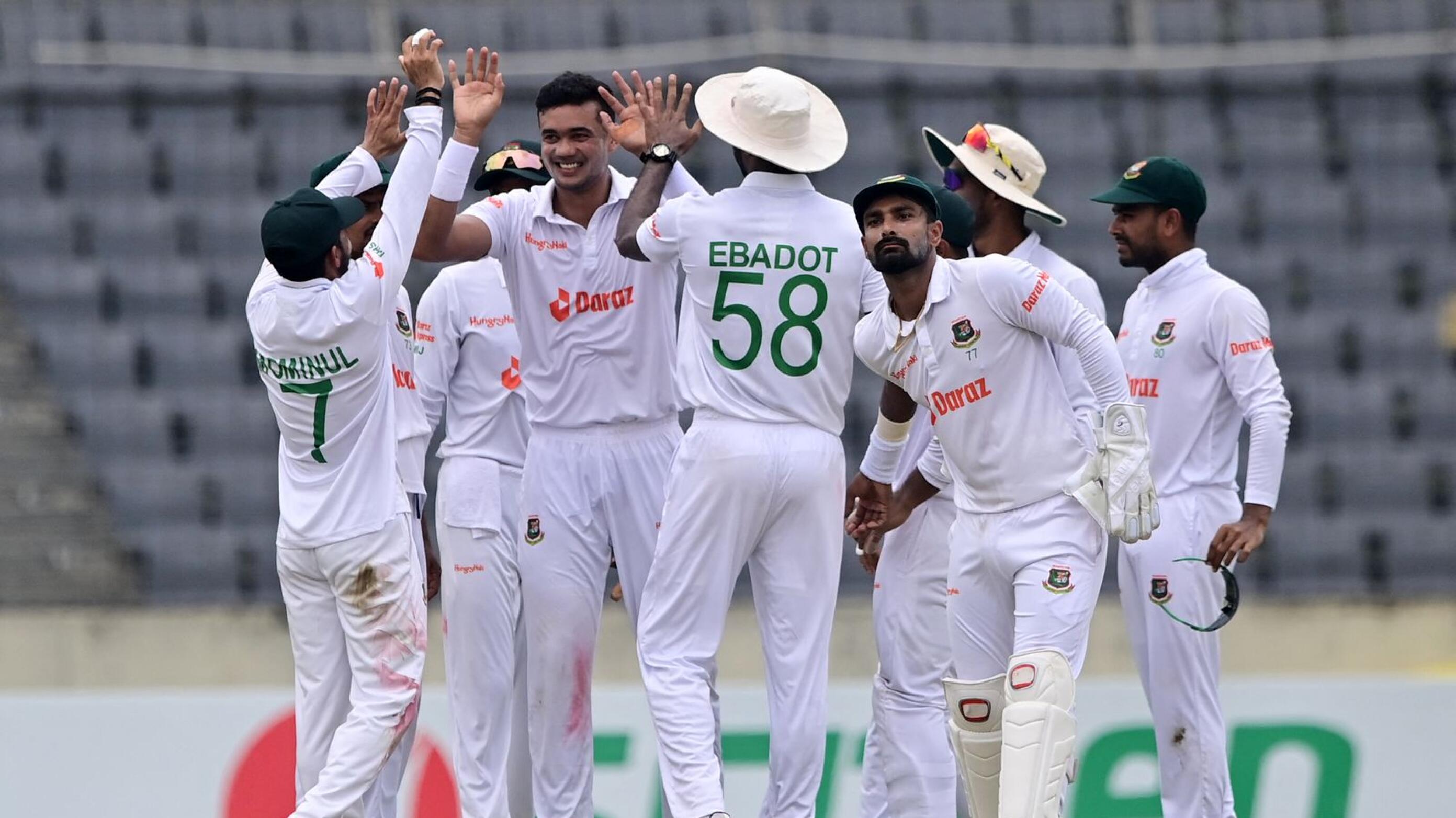 Bangladesh's Taskin Ahmed celebrates with teammates after the dismissal of Afghanistan's Rahmat Shah during the fourth day of their Test match at the Sher-e-Bangla National Cricket Stadium in Dhaka on Saturday