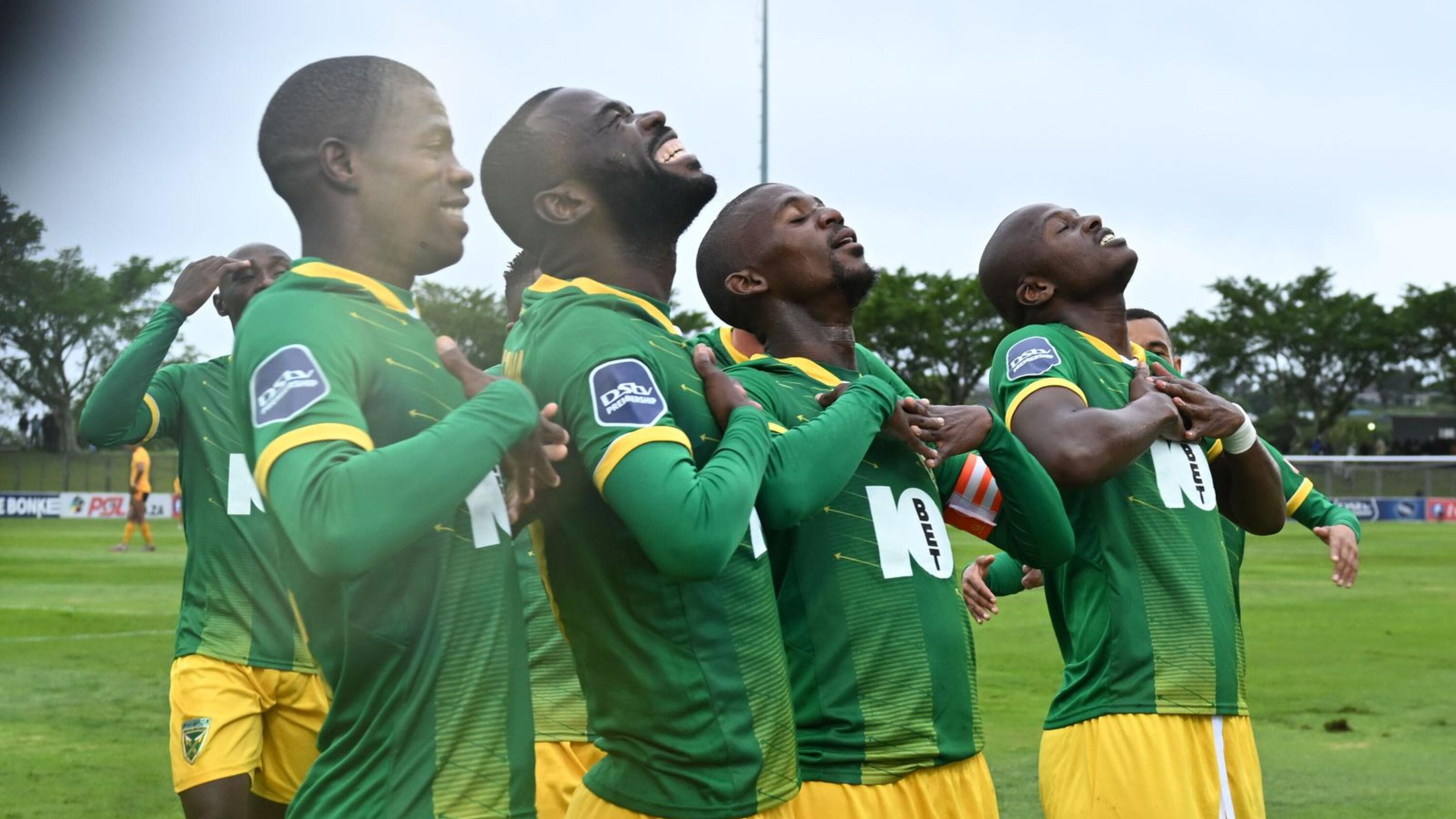 Golden Arrows’ Knox Mutizwa celebrates with teammates after scoring a goal during their DStv Premiership match against Kaizer Chiefs