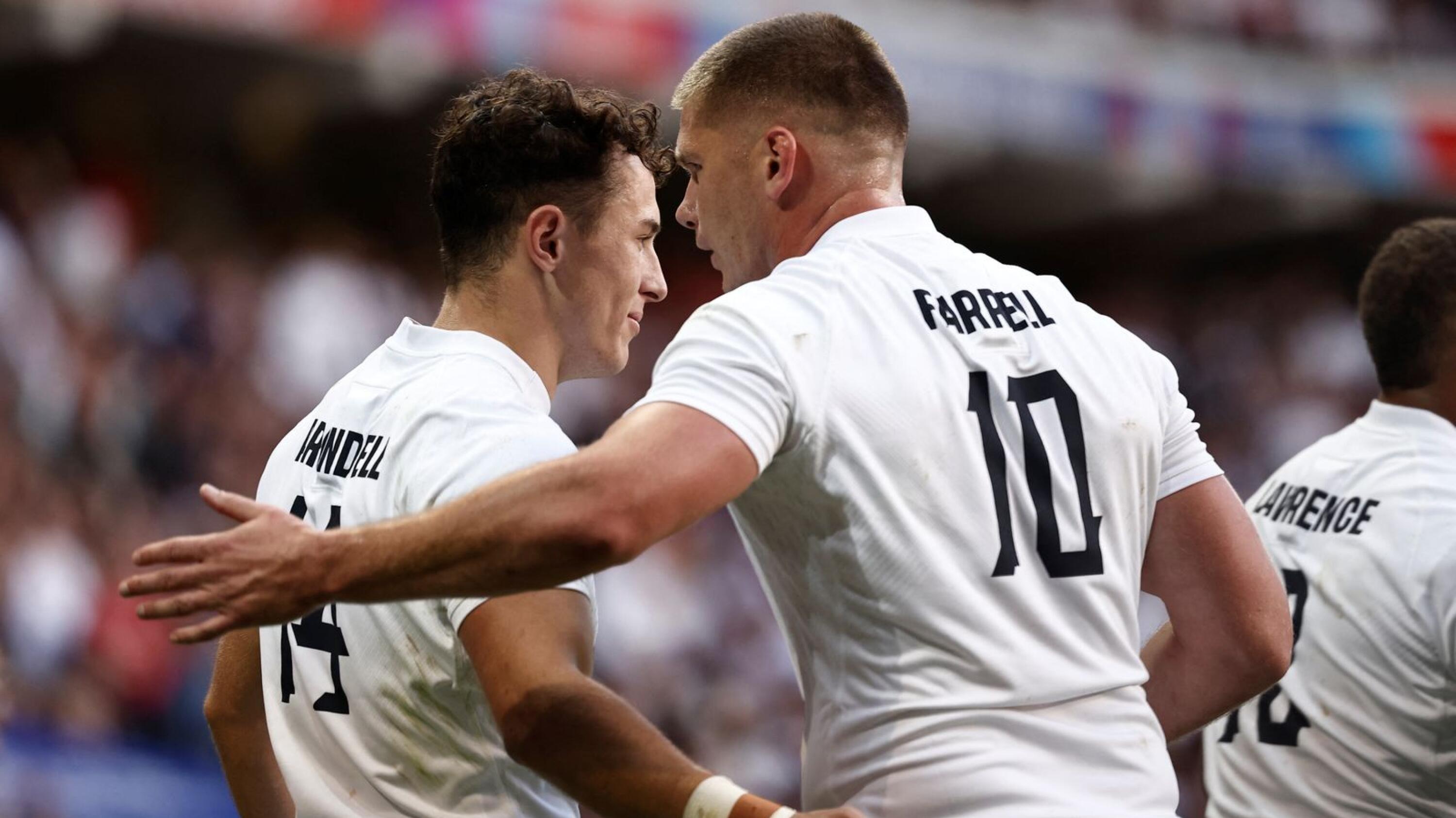 England's Henry Arundell celebrates with captain Owen Farrell after scoring a try during their Rugby World Cup Pool D match against Chile