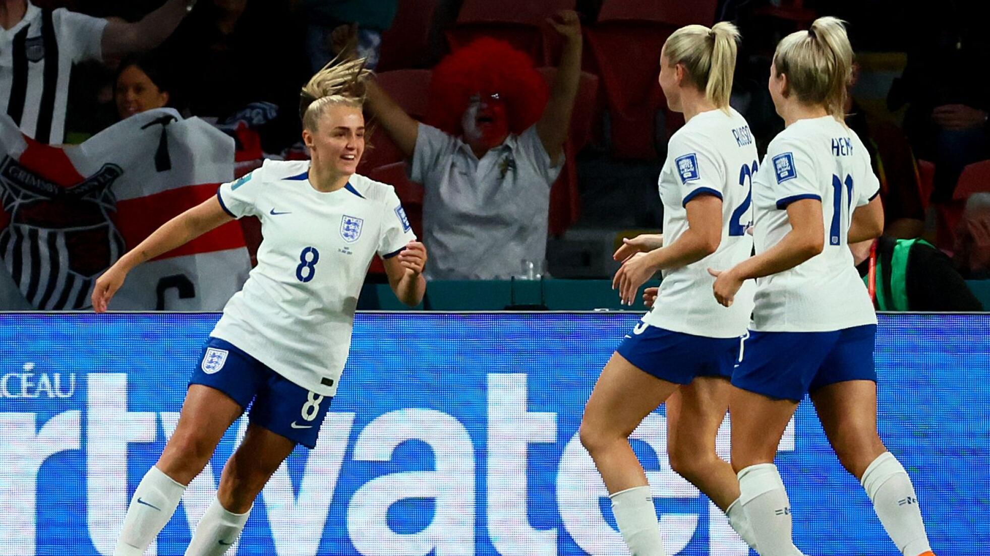 England midfielder Georgia Stanway celebrates with teammates after scoring the winning goal