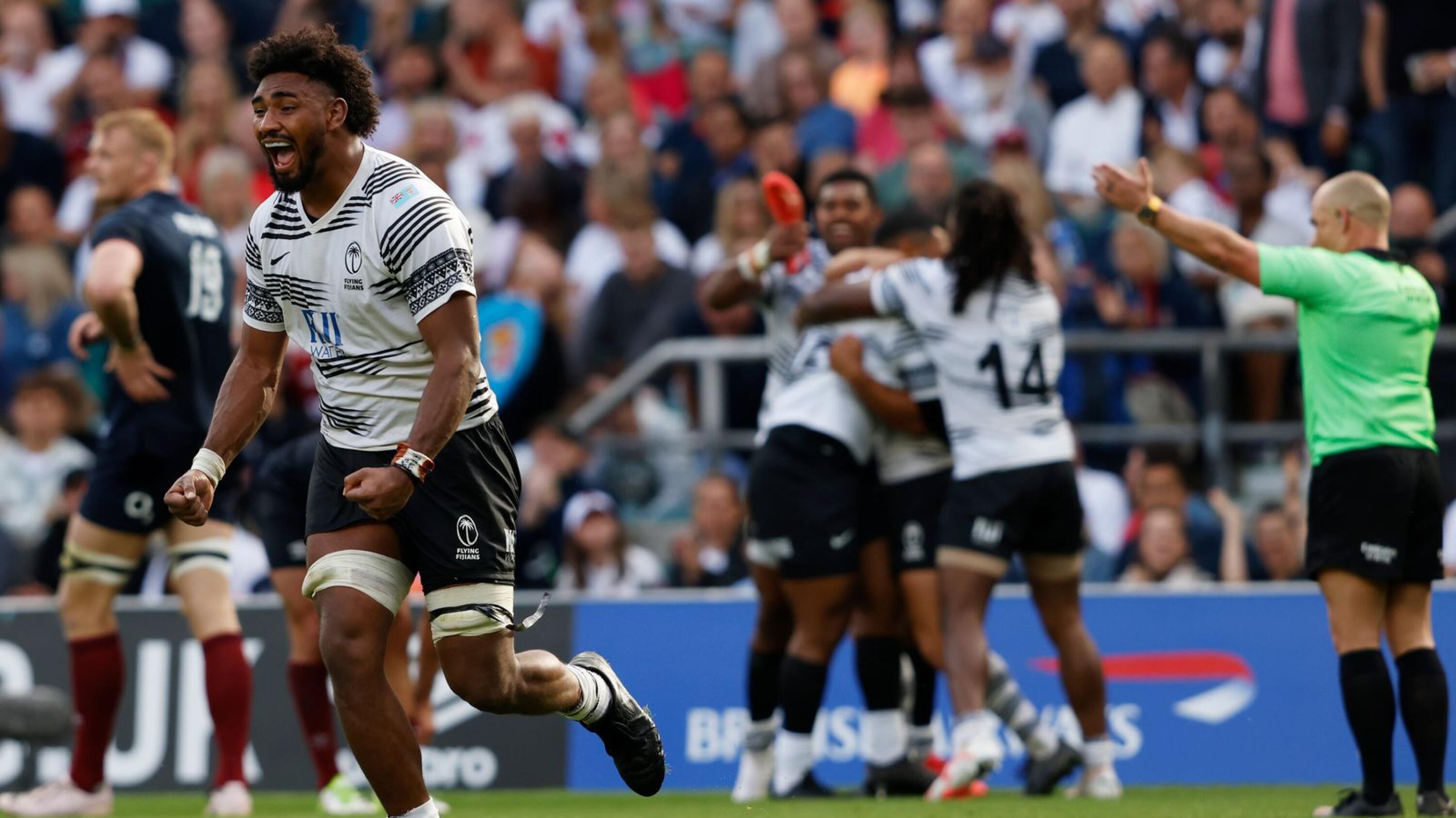 Fiji players celebrate on the final whistle during the pre-2023 World Cup warm-up rugby union match between England and Fiji at Twickenham Stadium in southwest London