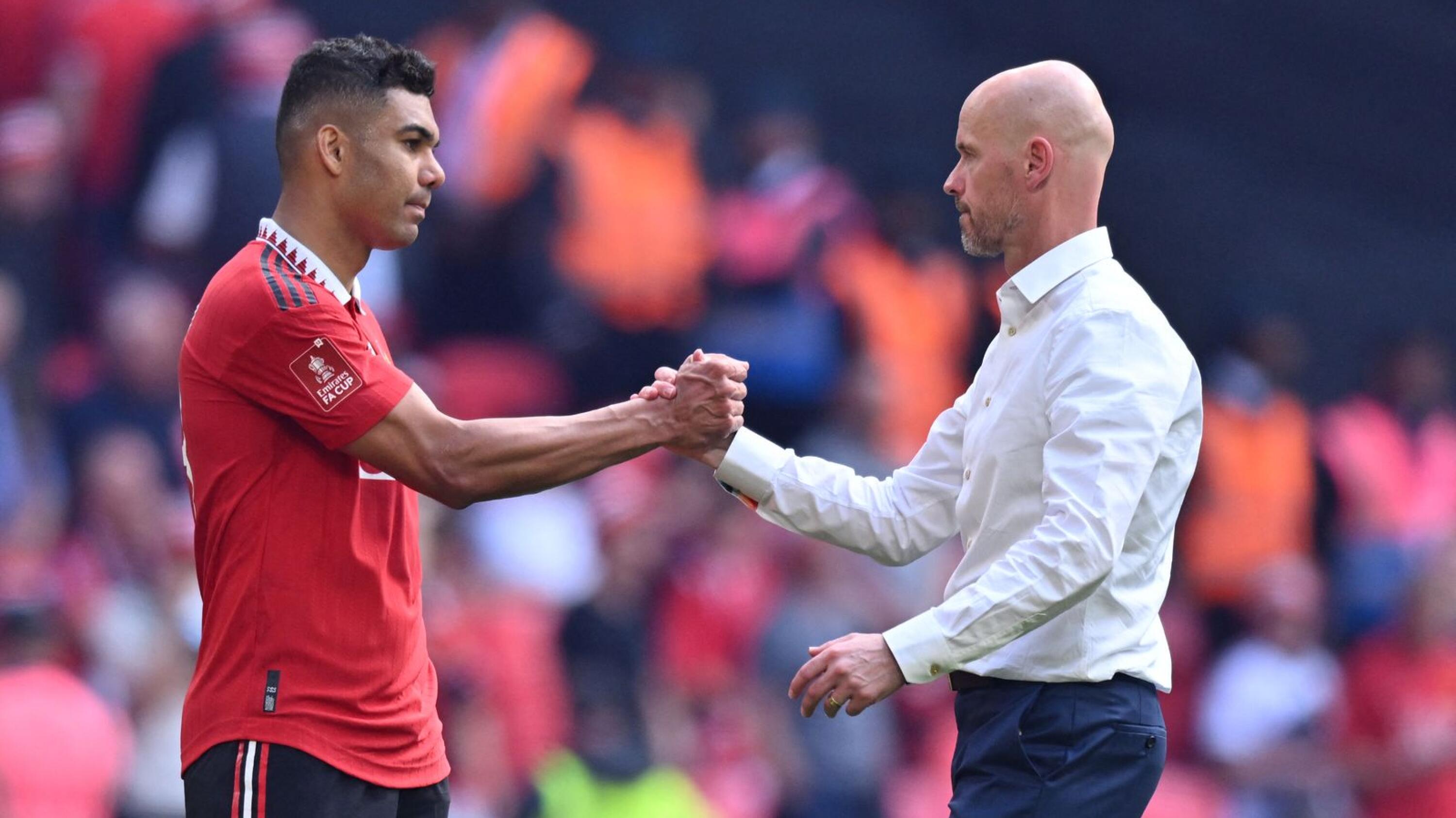 Manchester United manager Erik ten Hag consoles midfielder Casemiro after their FA Cup final loss to Manchester City at Wembley on Saturday