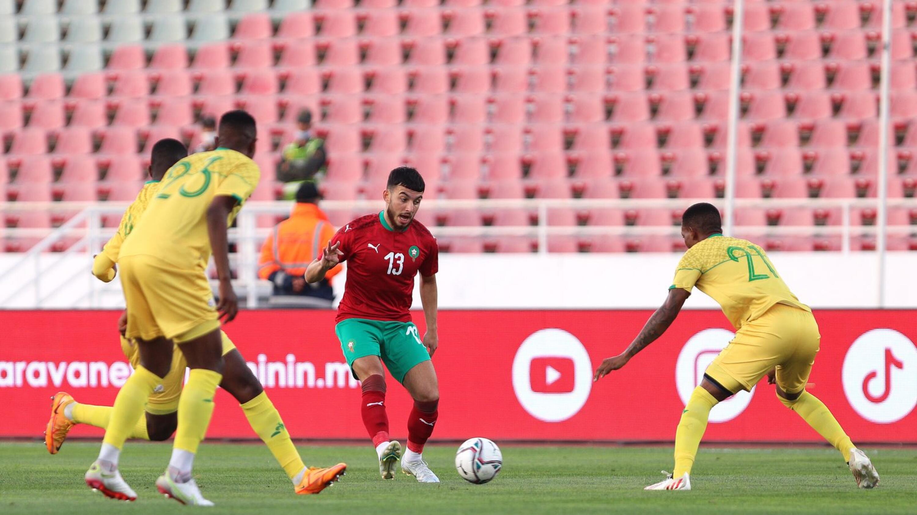 Ilias Chair of Morocco attempts to get through the South African defence during their 2023 Africa Cup of Nations qualifying football match at the Stade Prince Moulay Abdallah in Rabat, Morocco on Thursday