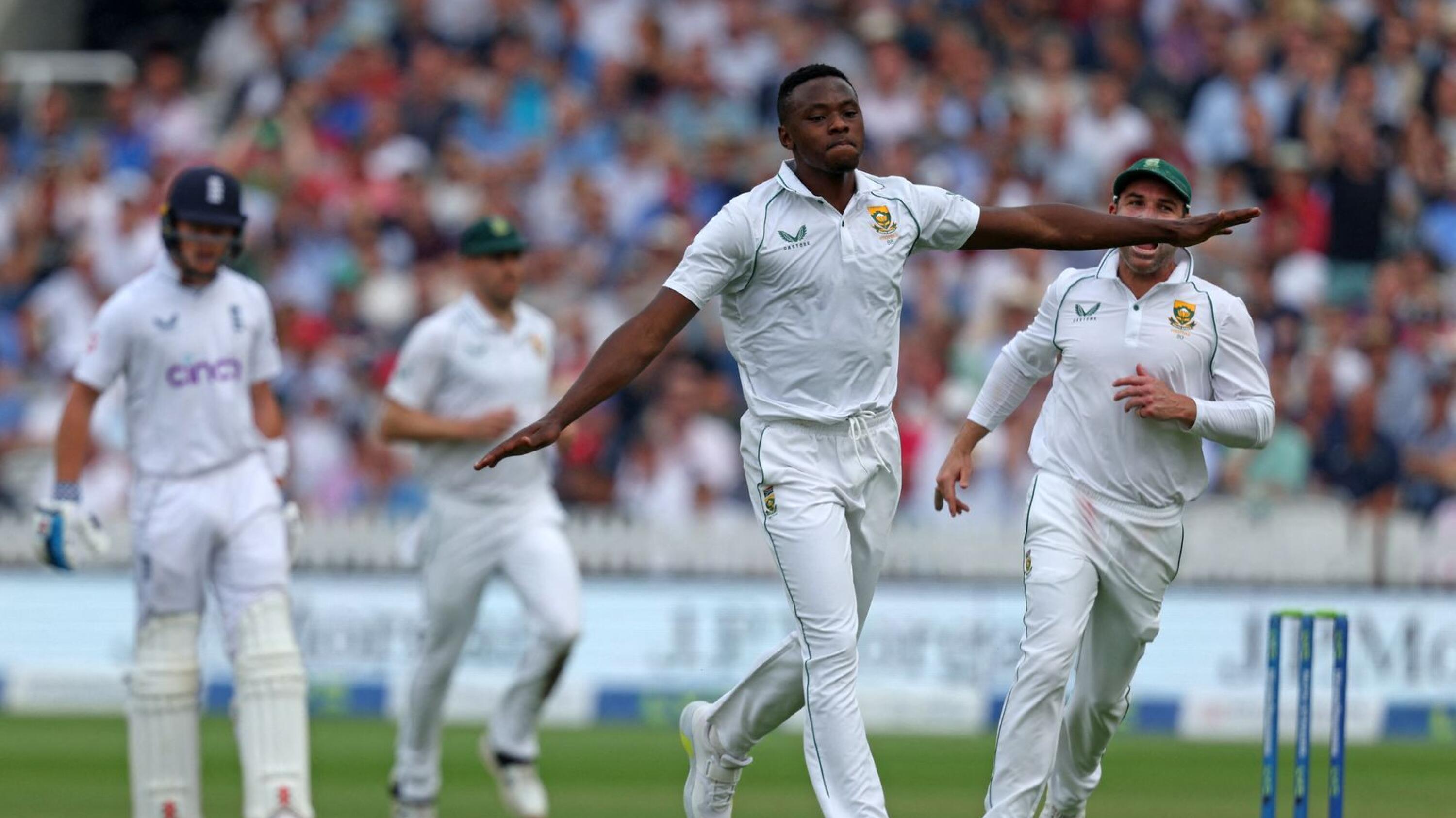 South Africa's Kagiso Rabada celebrates after taking the wicket of England's Zak Crawley during play on the opening day of the first Test match at Lord's Cricket Ground in London on Wednesday